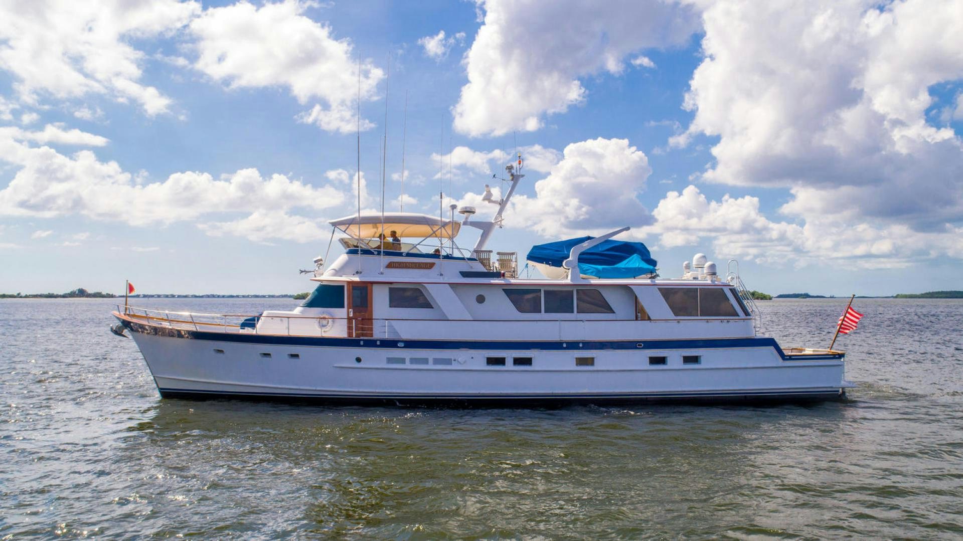 a boat on the water aboard HIGH MILEAGE Yacht for Sale