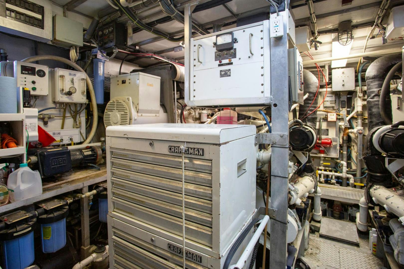 a room with machinery aboard HIGH MILEAGE Yacht for Sale