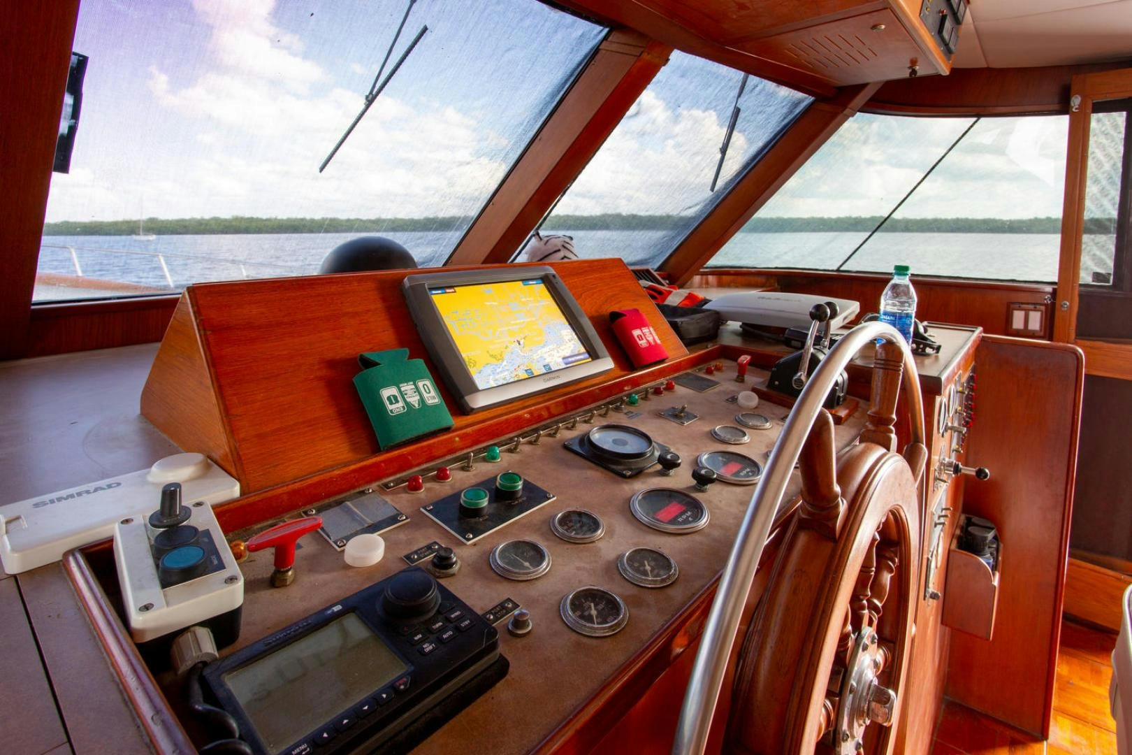 a kitchen with a large window aboard HIGH MILEAGE Yacht for Sale