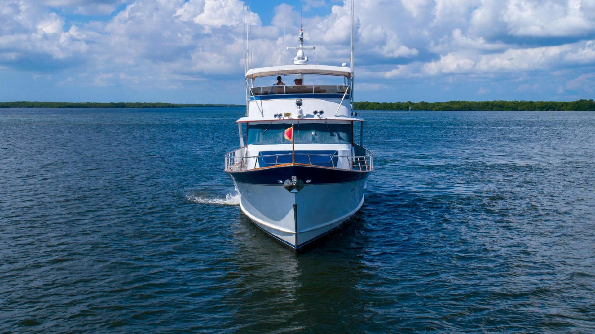 a boat on the water aboard HIGH MILEAGE Yacht for Sale