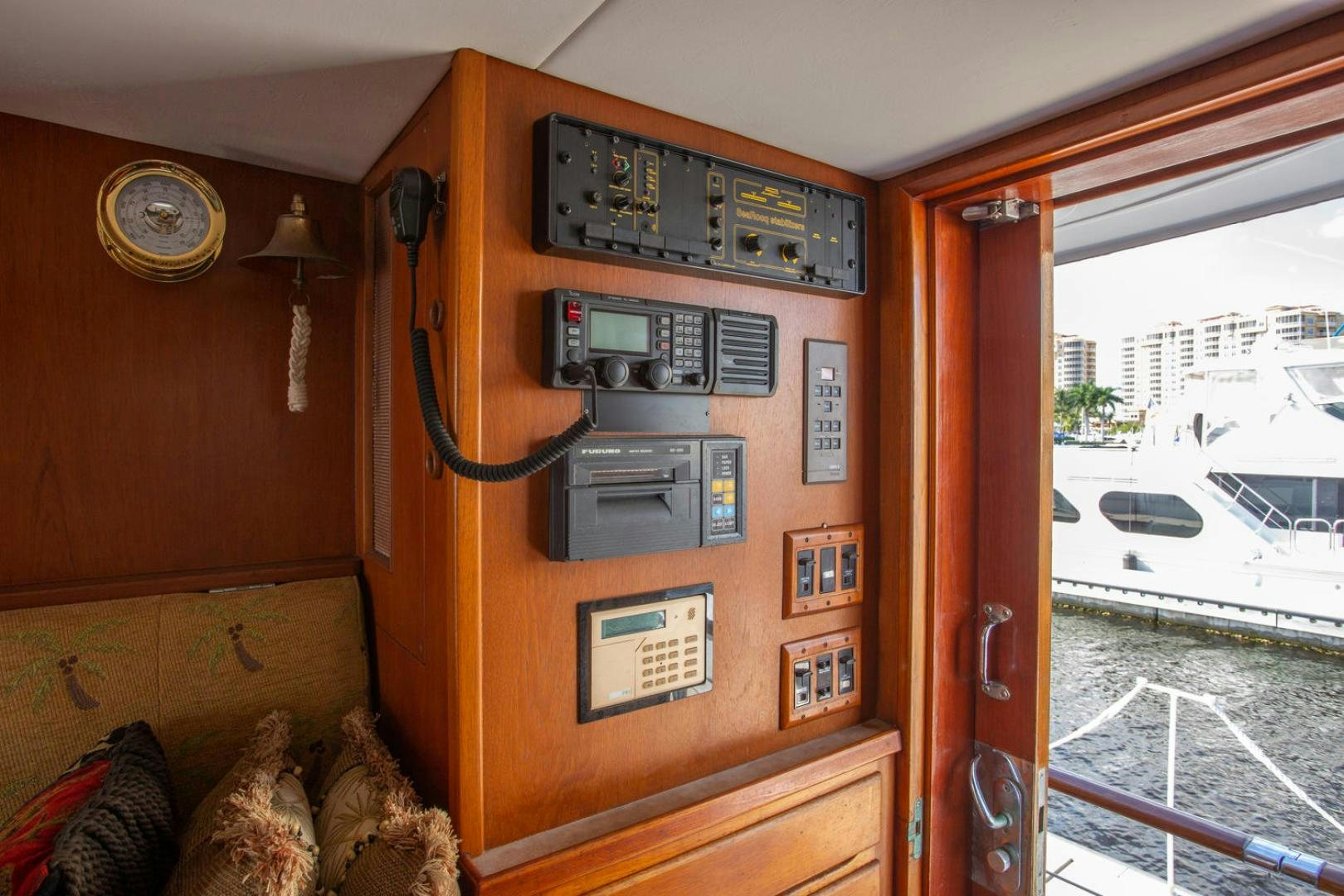 a clock on a wall aboard HIGH MILEAGE Yacht for Sale
