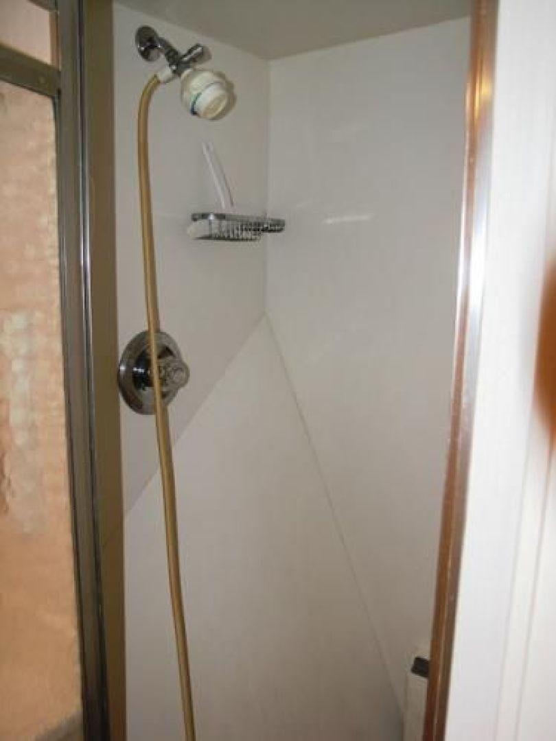 a shower with a handle aboard HIGH MILEAGE Yacht for Sale