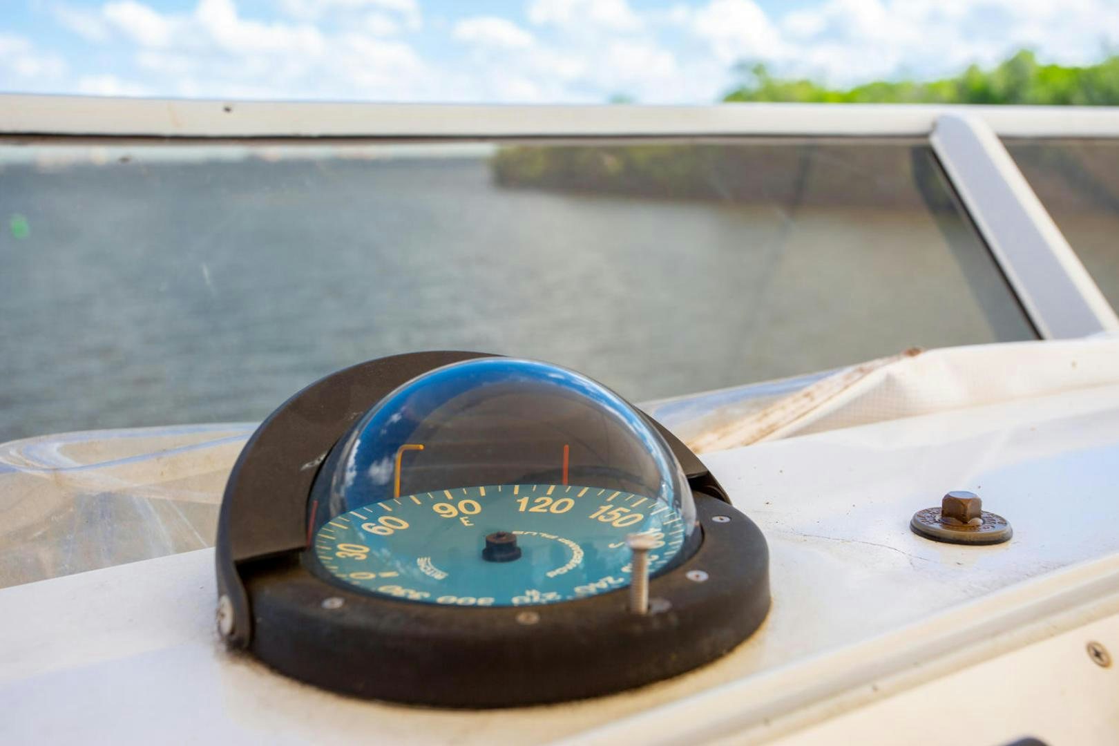 a close-up of a speedometer aboard HIGH MILEAGE Yacht for Sale