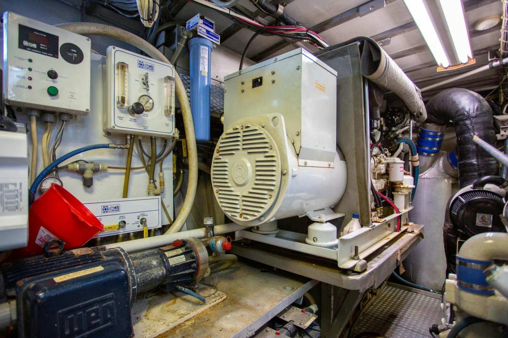 a machine with a large piece of equipment in it aboard HIGH MILEAGE Yacht for Sale