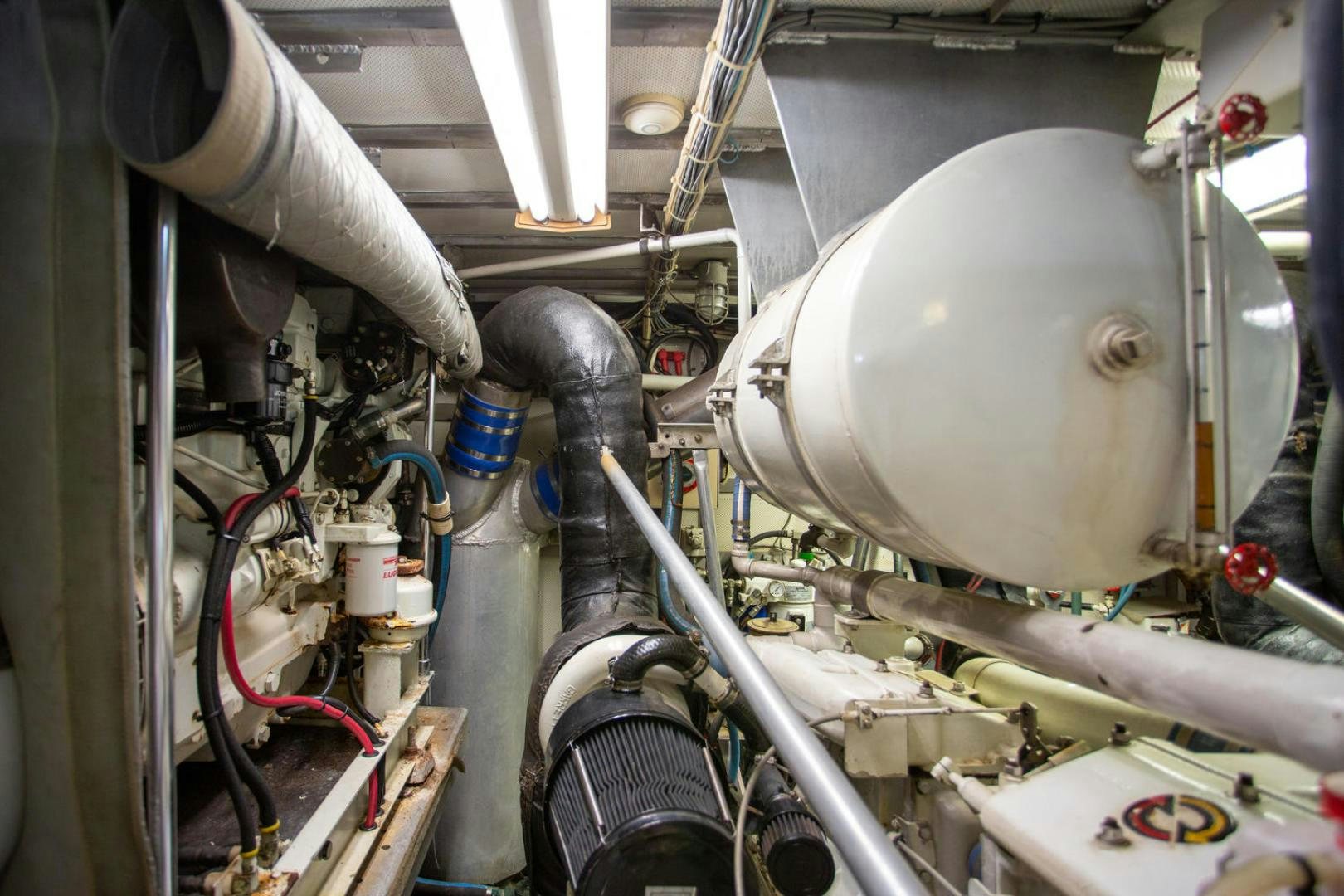 a machine with a large metal cylinder aboard HIGH MILEAGE Yacht for Sale