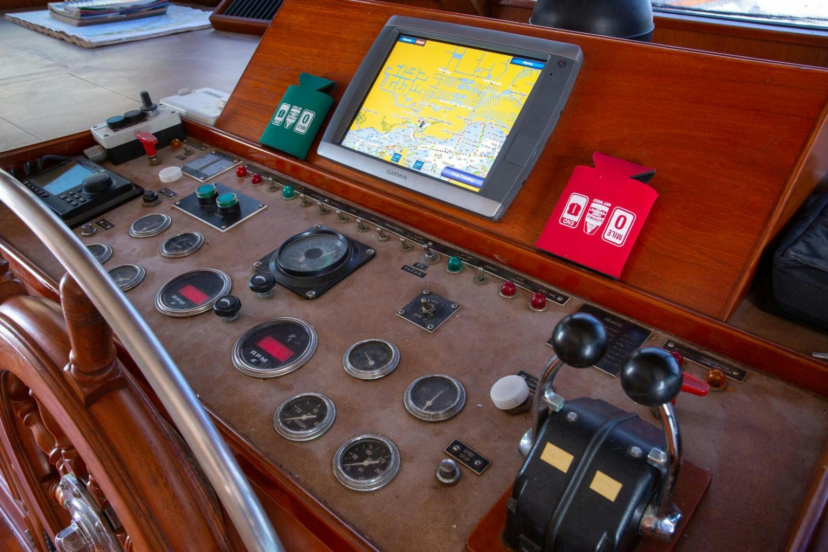 a table with a game controller and a game controller on it aboard HIGH MILEAGE Yacht for Sale