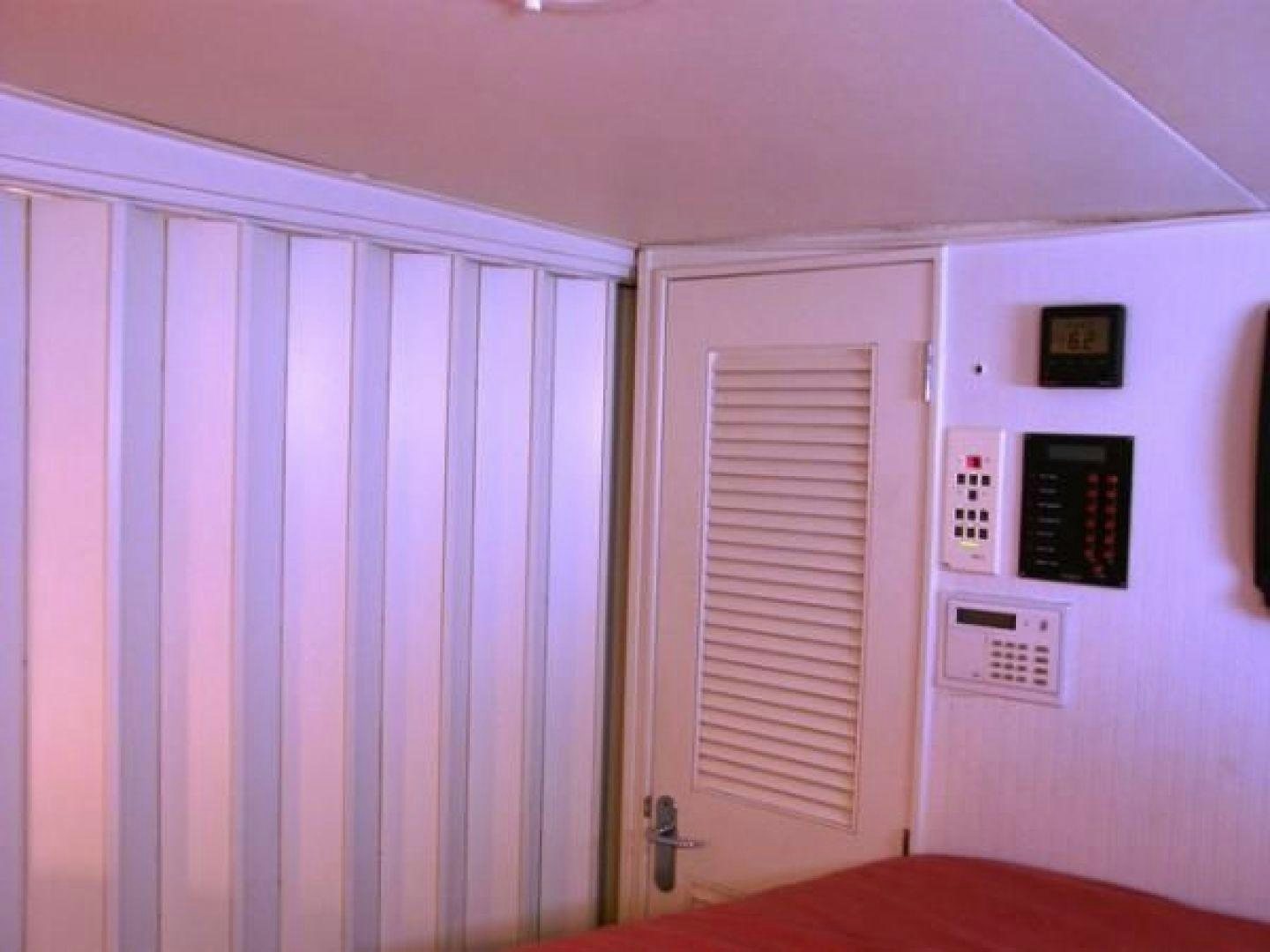 a white door and a white wall aboard HIGH MILEAGE Yacht for Sale