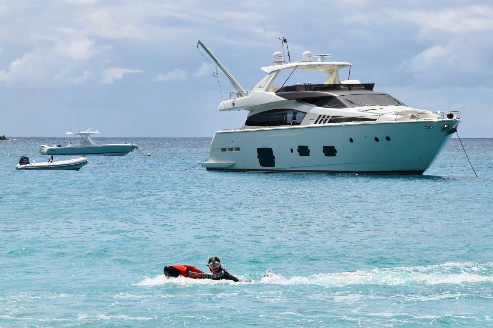 a person and a boat in the water aboard LA PACE Yacht for Sale