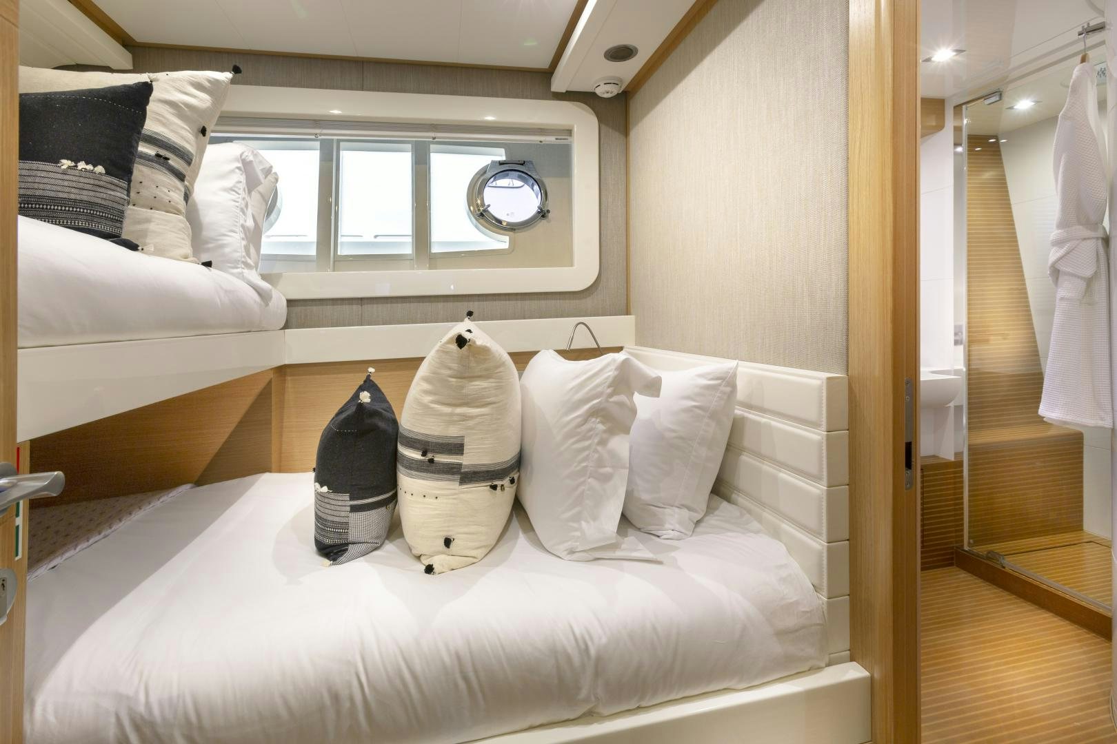 a bed with pillows and pillows aboard LA PACE Yacht for Sale