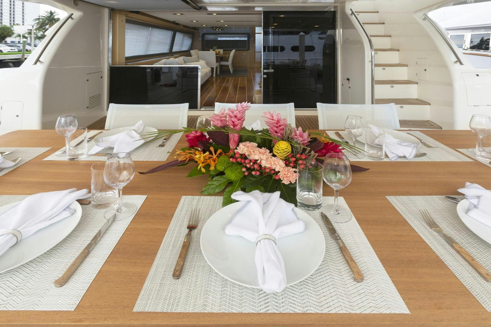 a table with place settings aboard LA PACE Yacht for Sale