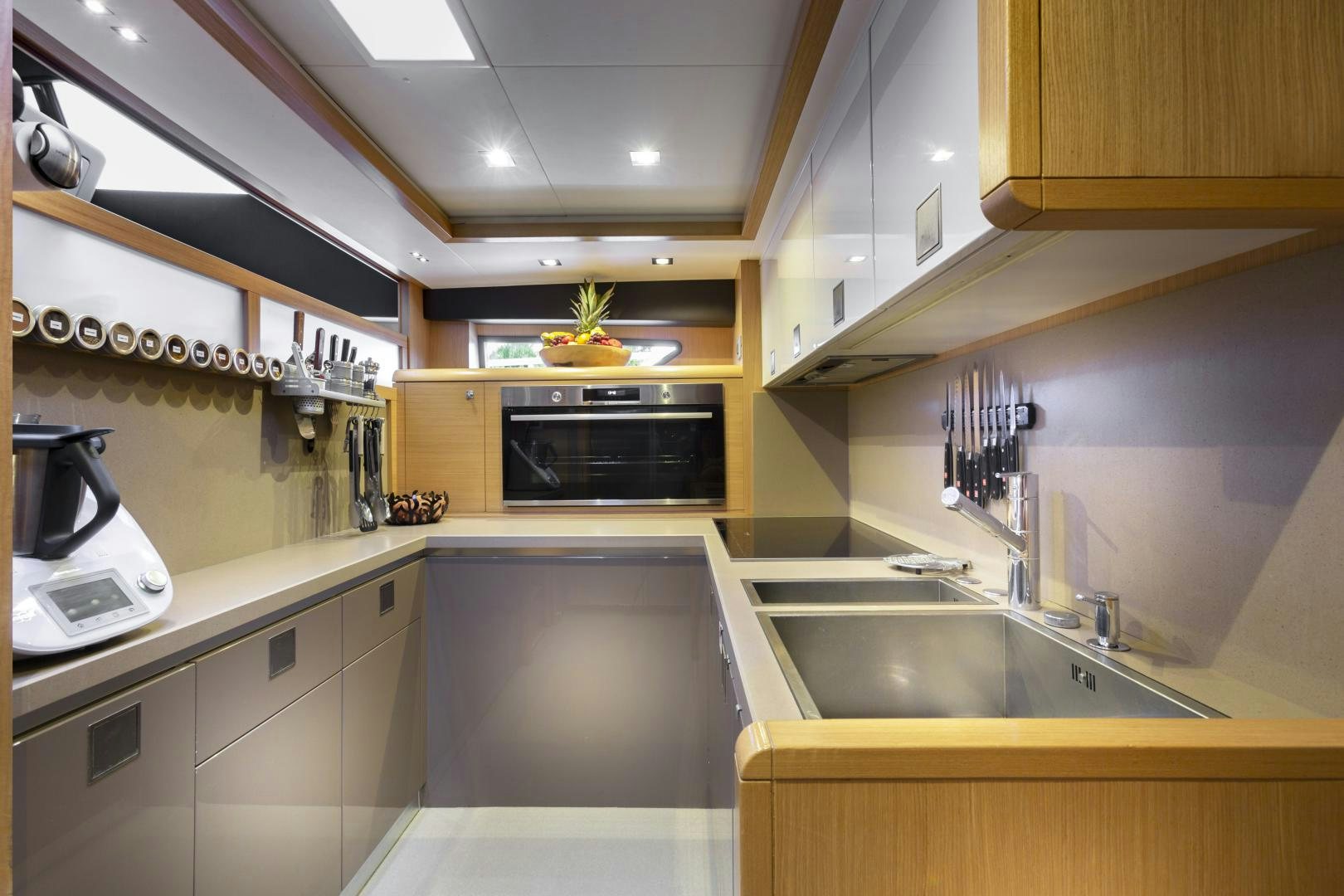 a kitchen with a sink and cabinets aboard LA PACE Yacht for Sale