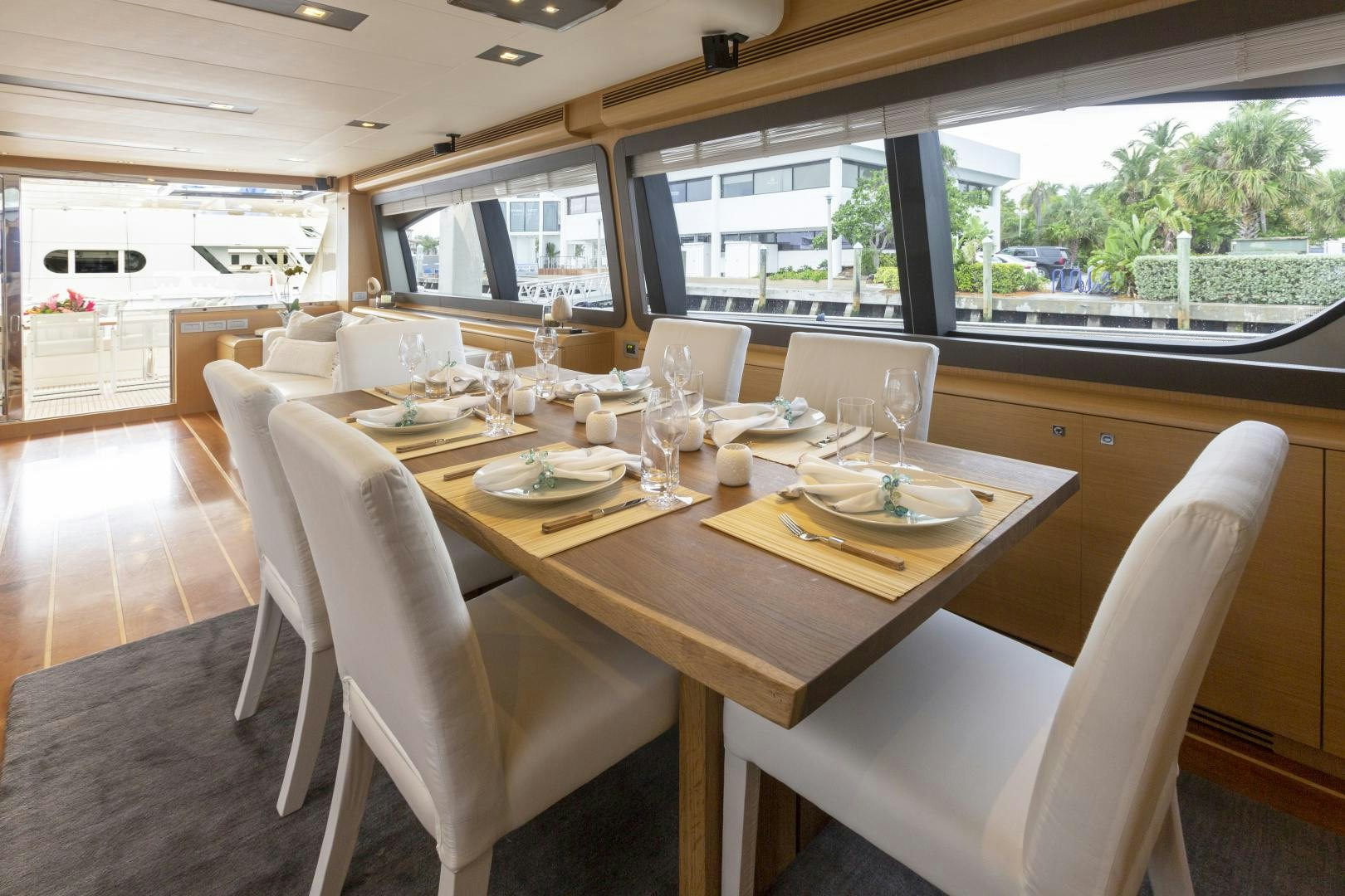 a dining table in a room aboard LA PACE Yacht for Sale