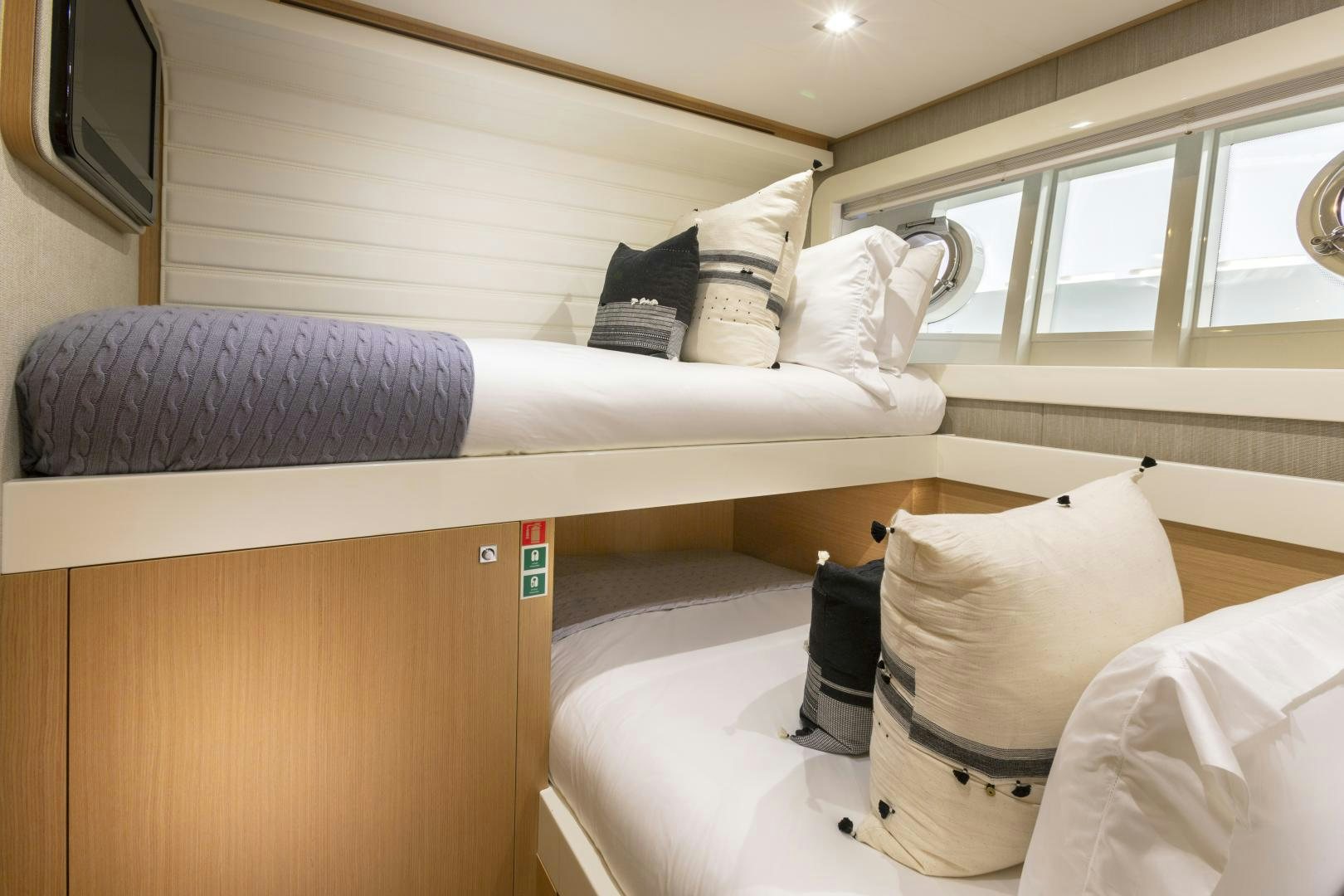 a bed with pillows and pillows aboard LA PACE Yacht for Sale
