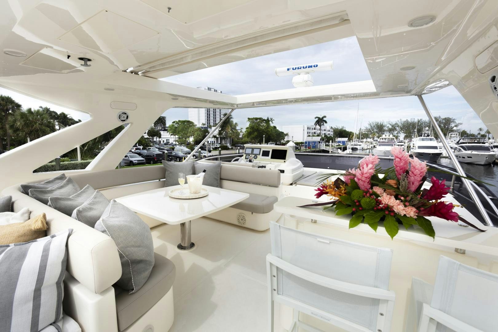 a room with white chairs and tables aboard LA PACE Yacht for Sale