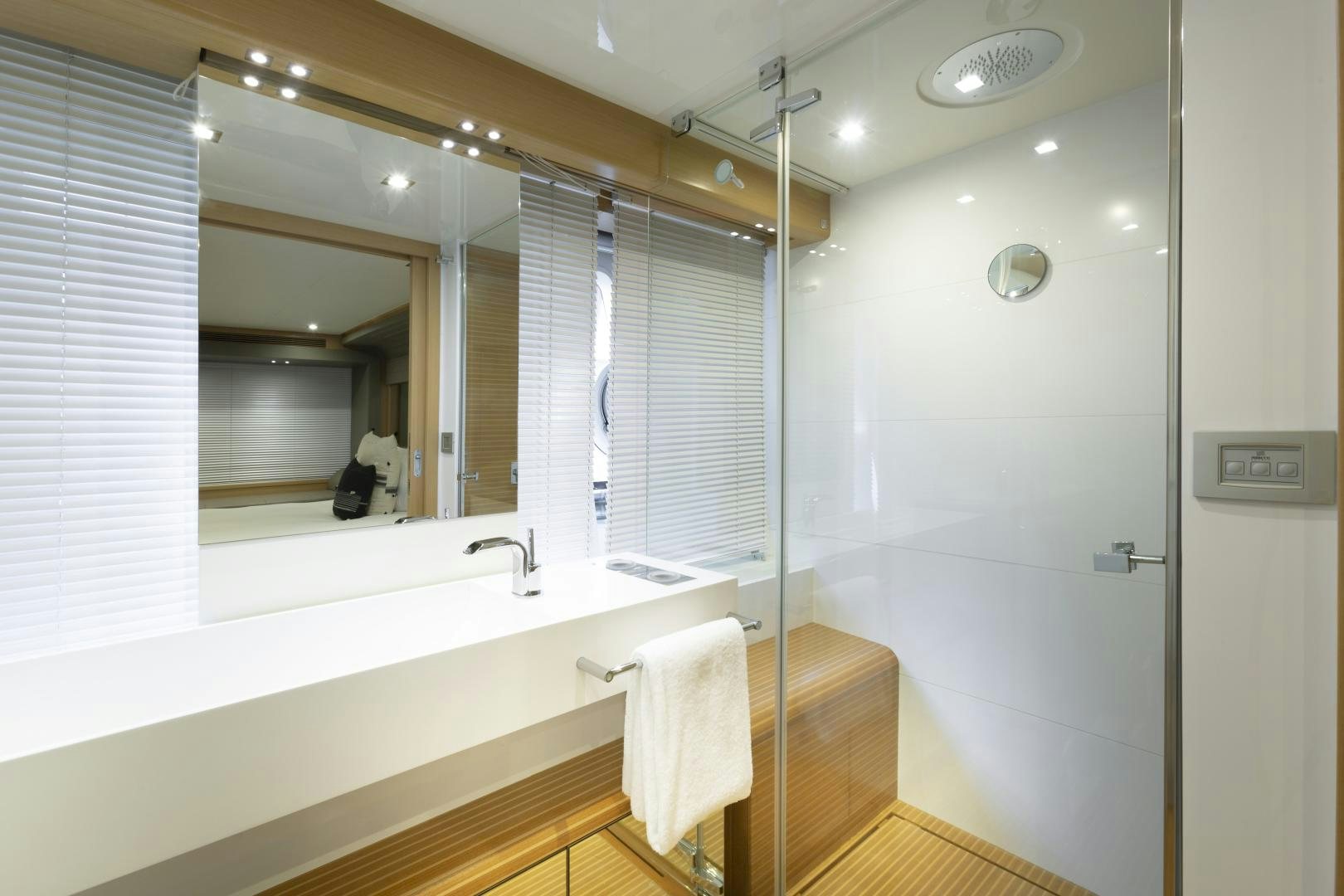 a bathroom with a large mirror aboard LA PACE Yacht for Sale