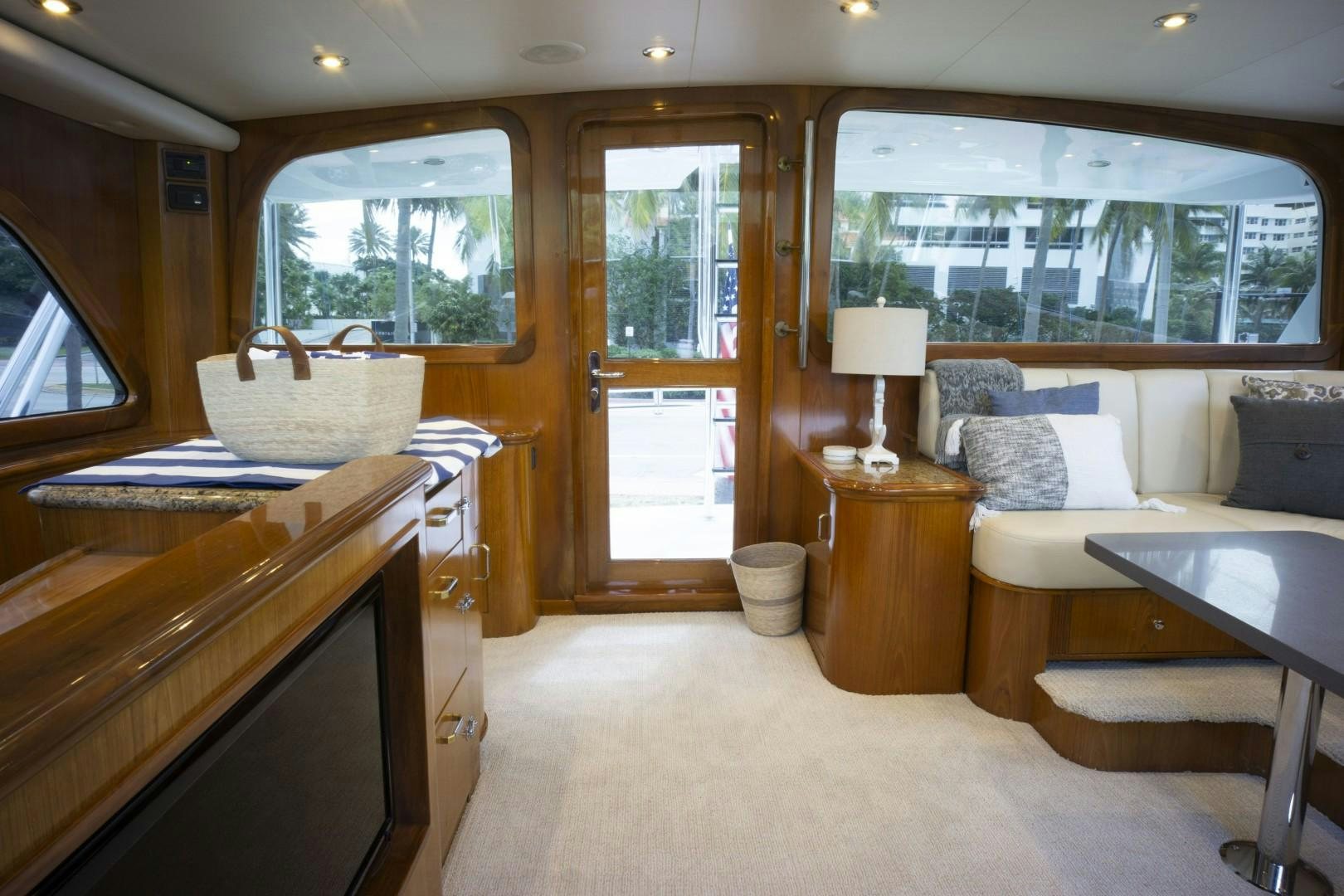 a bedroom with a bed and a desk aboard REEL DEAL Yacht for Sale