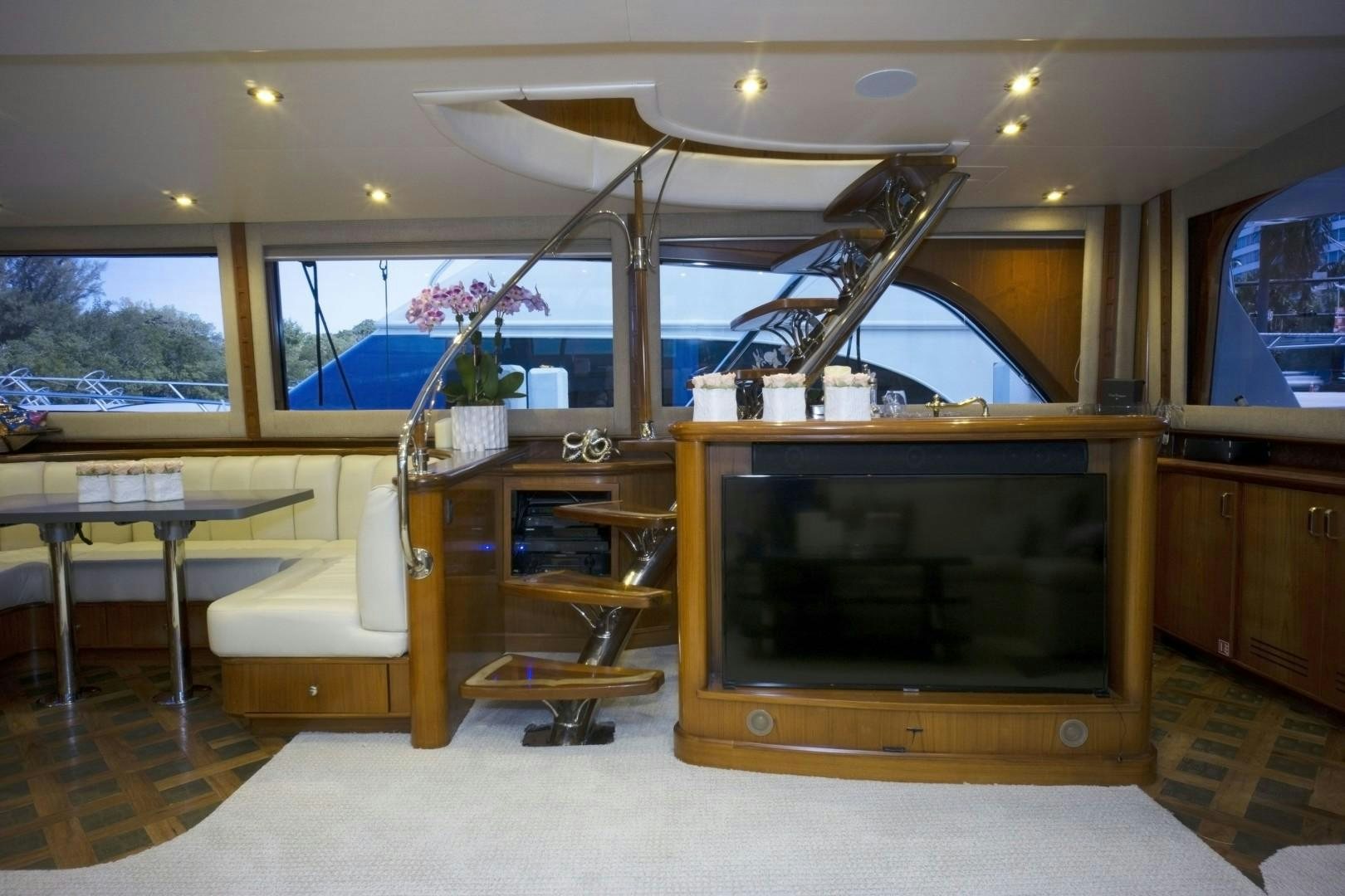 a tv in a room aboard REEL DEAL Yacht for Sale