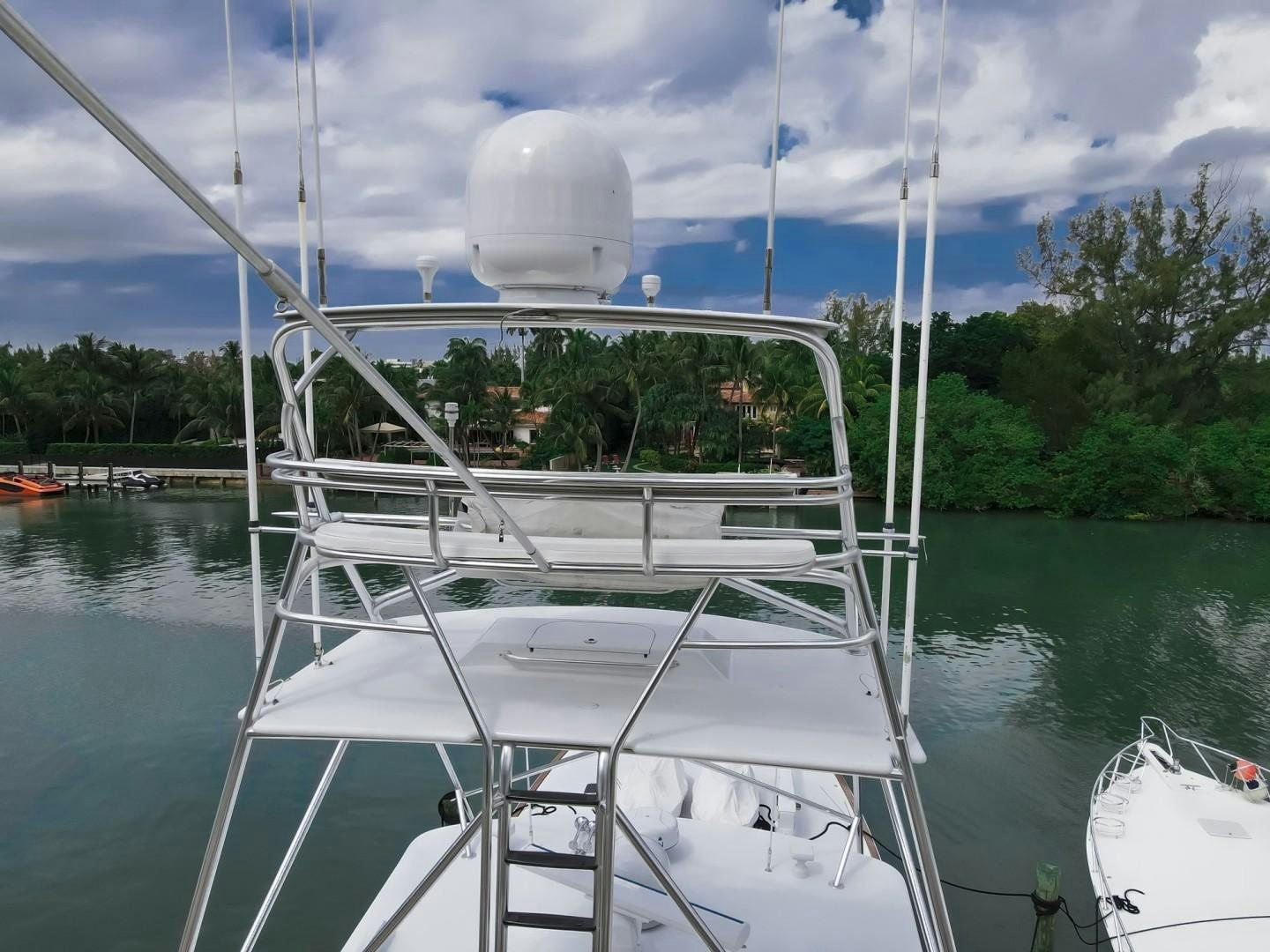 a white boat in the water aboard REEL DEAL Yacht for Sale