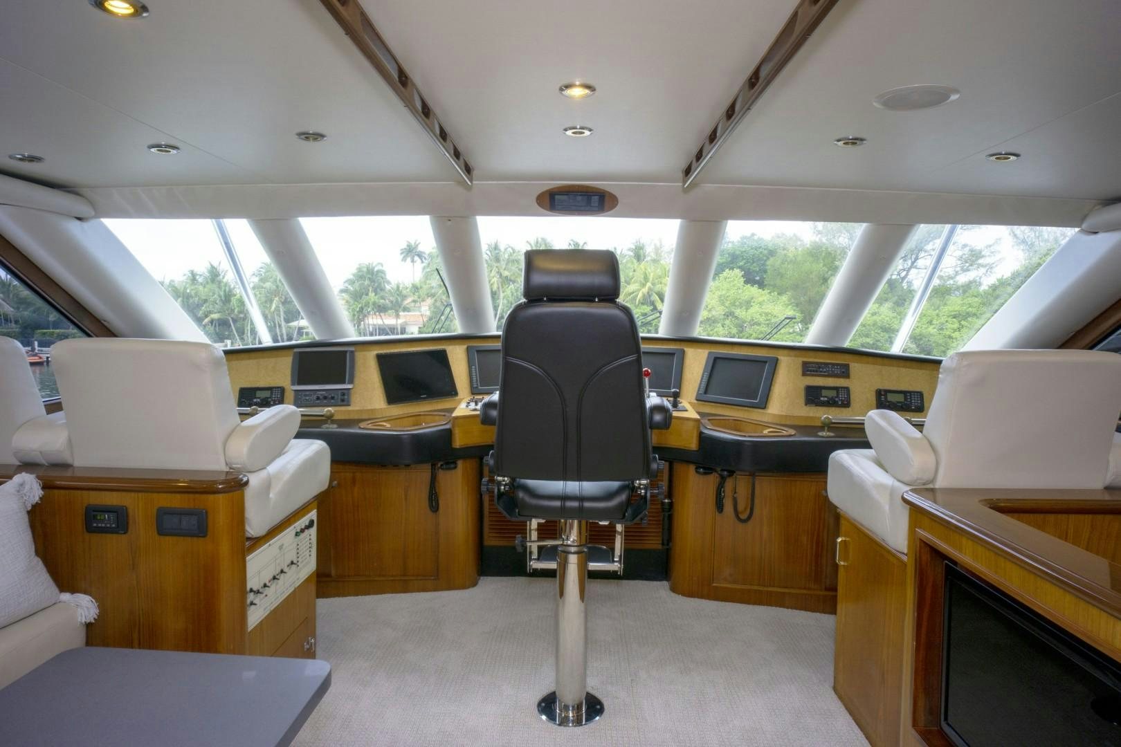 a room with a chair and desk aboard REEL DEAL Yacht for Sale