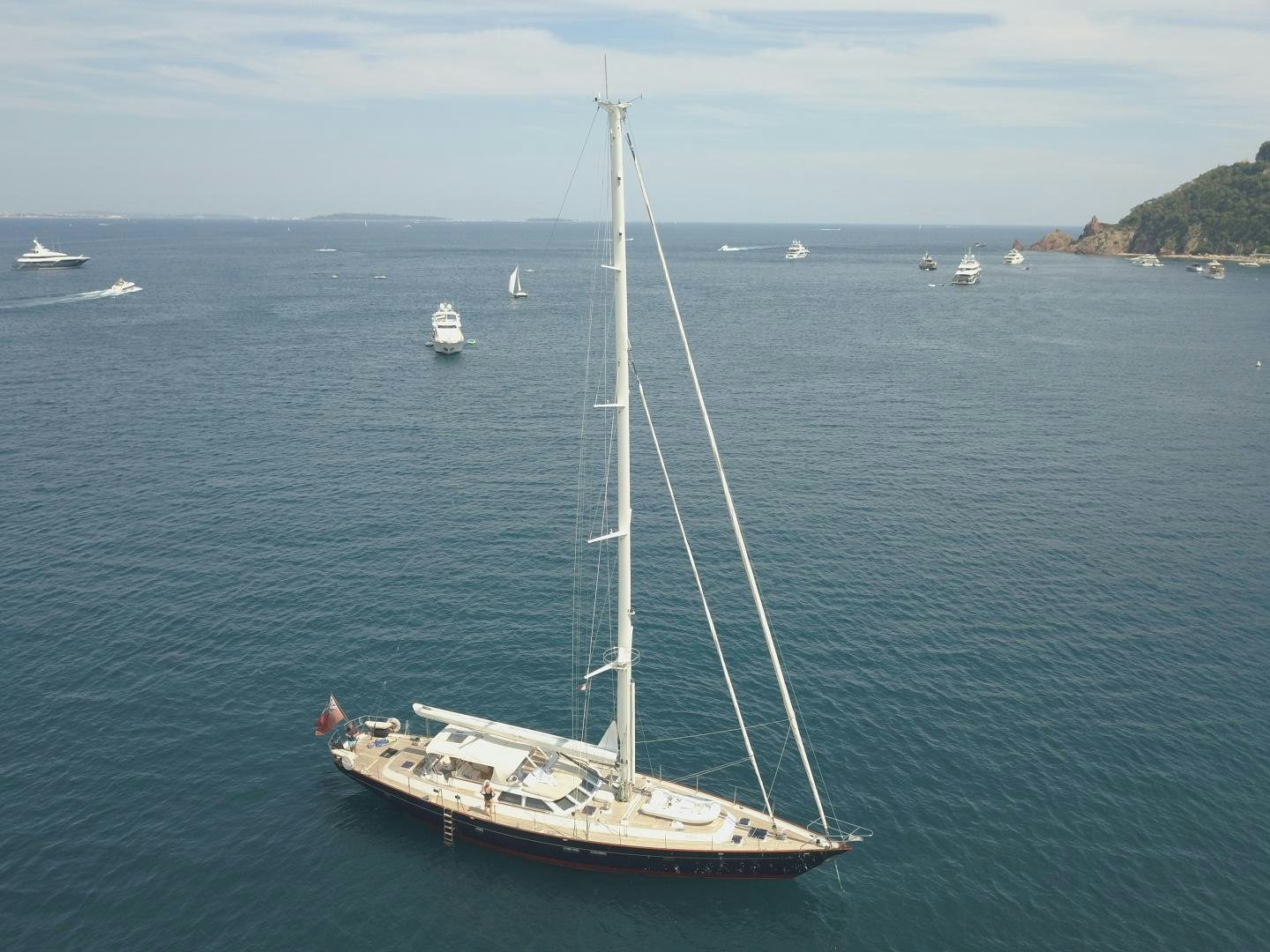 a sailboat on the water aboard TIGA BELAS Yacht for Sale
