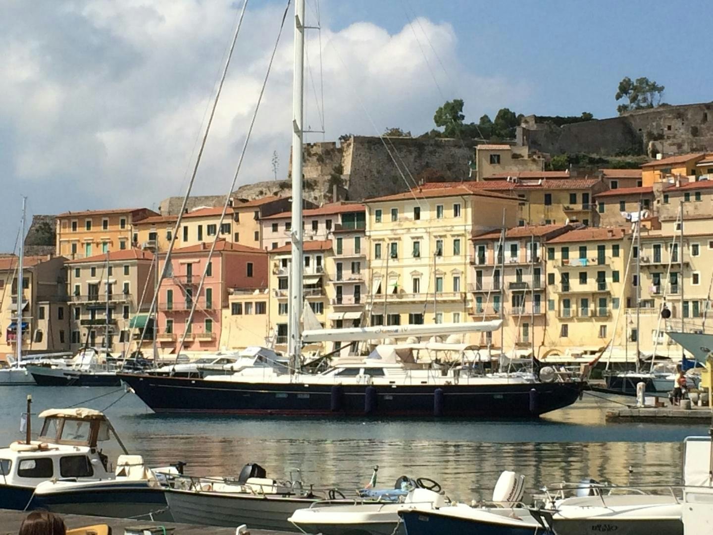 a group of boats in a harbor aboard TIGA BELAS Yacht for Sale