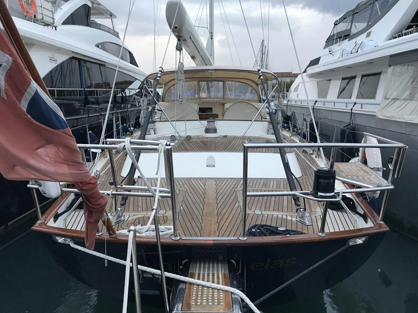 a group of boats in a harbor aboard TIGA BELAS Yacht for Sale