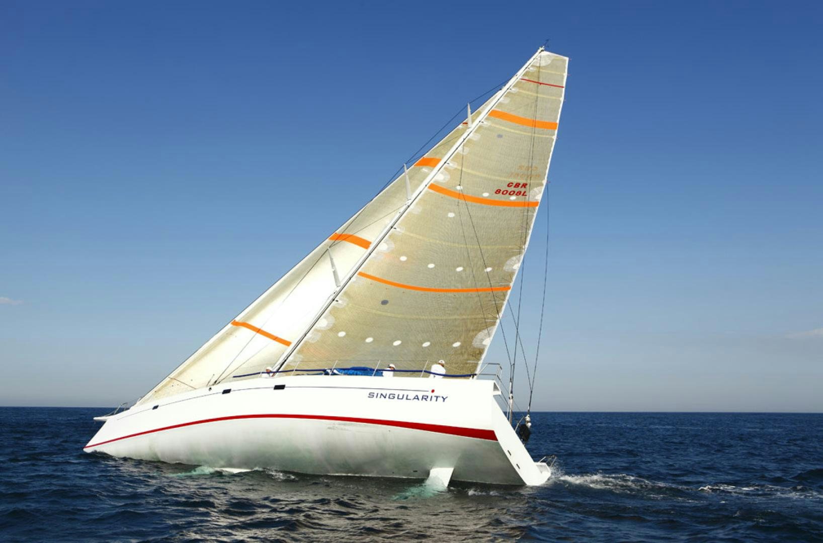a sailboat in the ocean aboard SINGULARITY Yacht for Sale