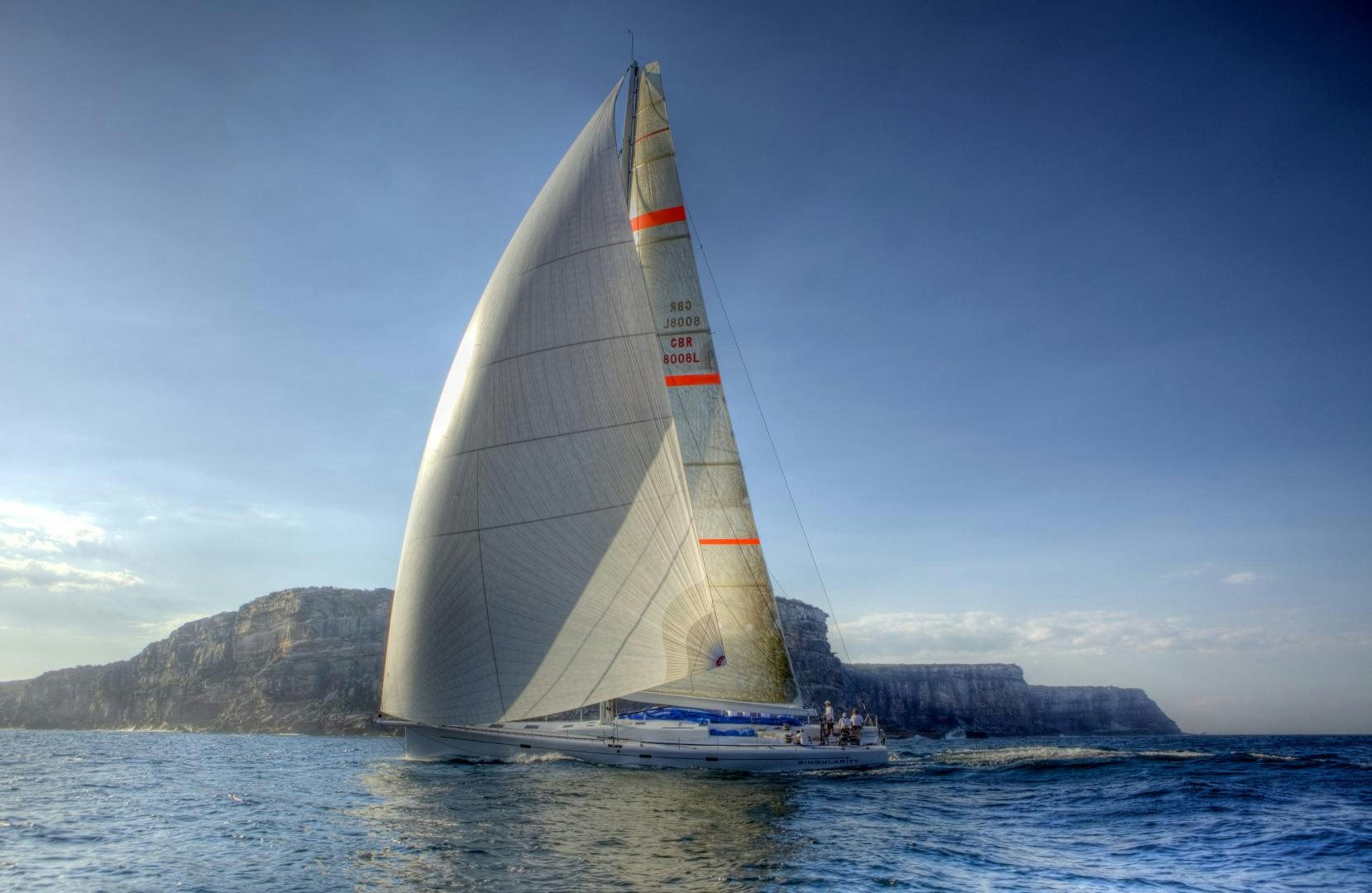 a sailboat on the water aboard SINGULARITY Yacht for Sale