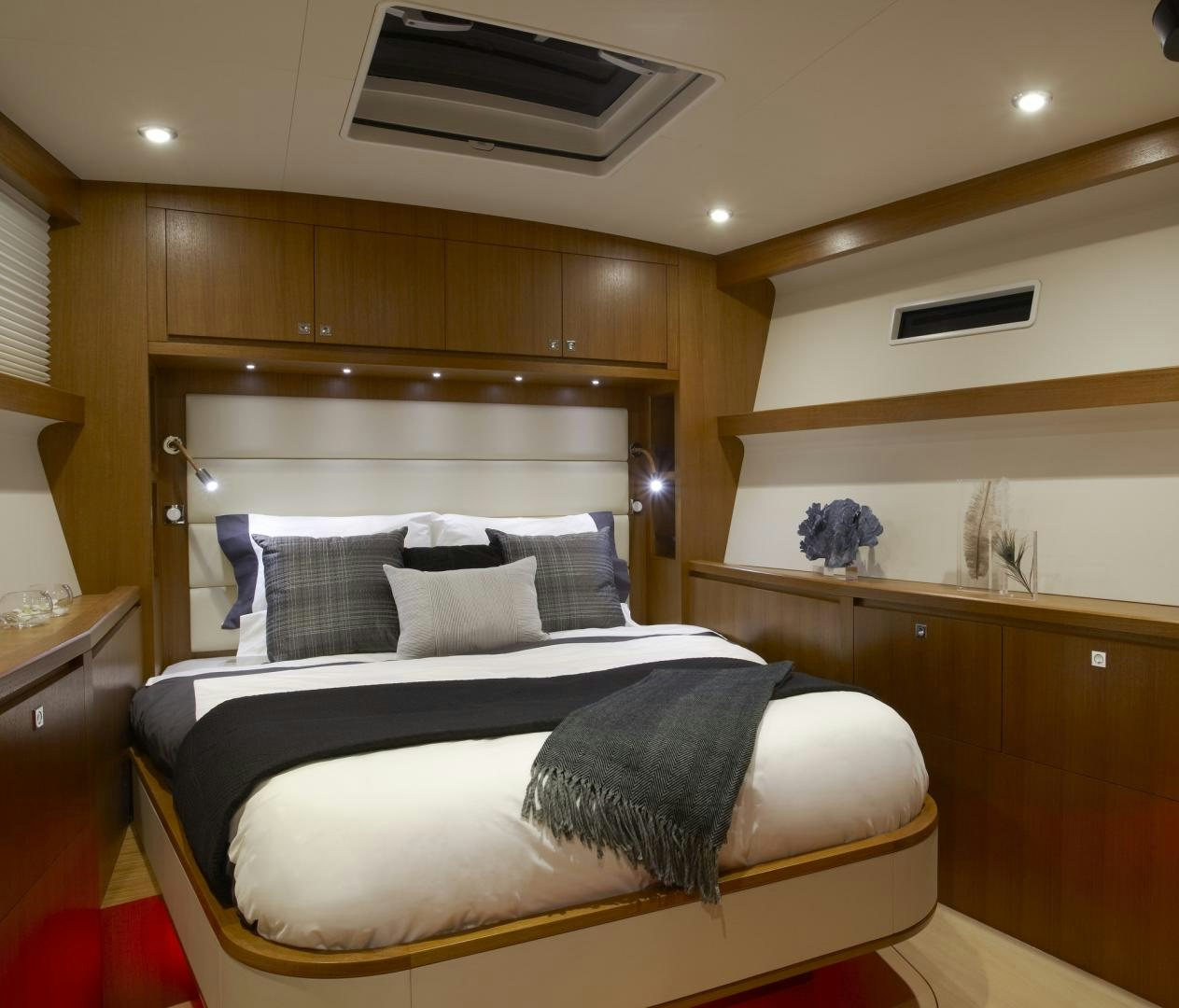 a bed in a room aboard SINGULARITY Yacht for Sale