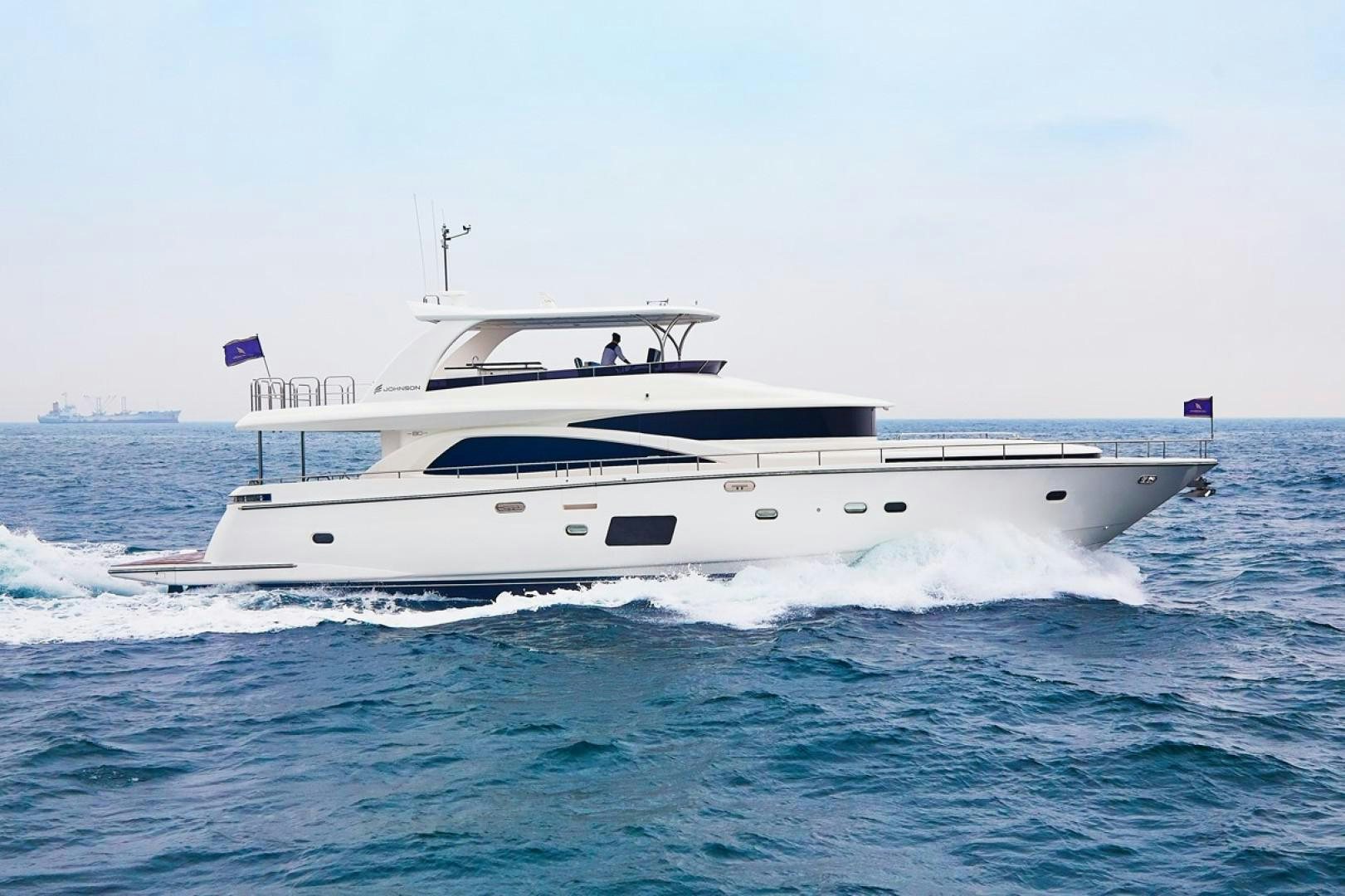 a white yacht on the water aboard No Name Yacht for Sale