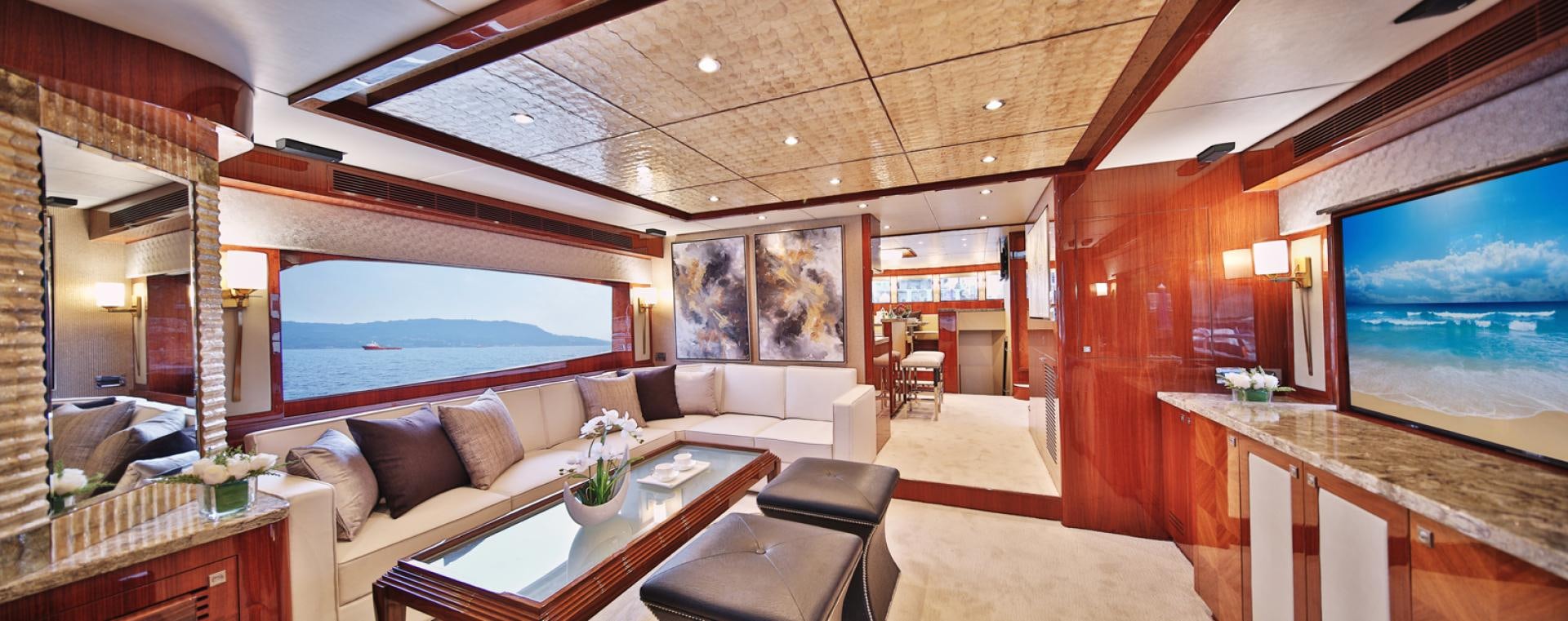 a room with a large window and a couch aboard No Name Yacht for Sale