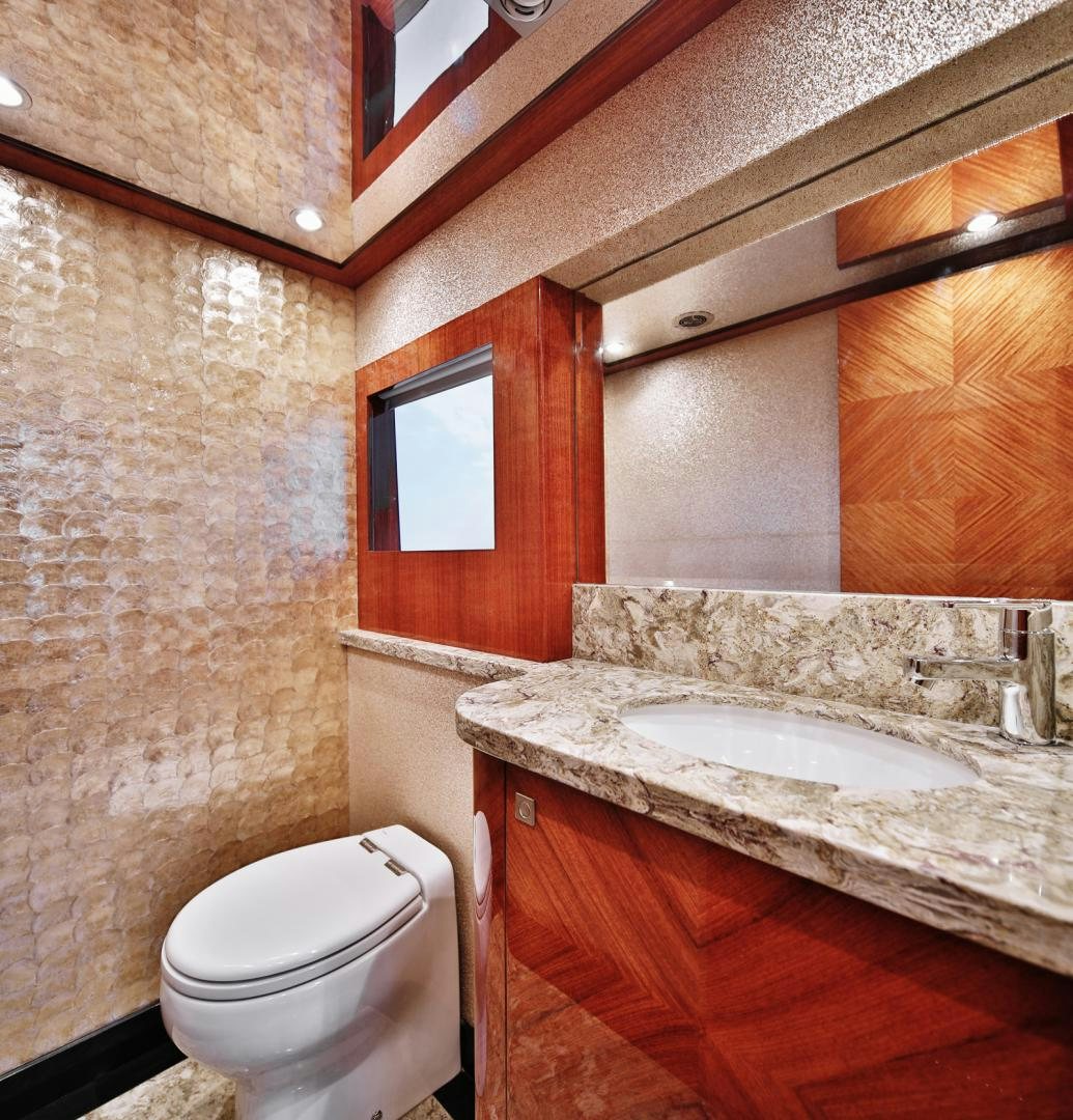 a bathroom with a sink and toilet aboard No Name Yacht for Sale