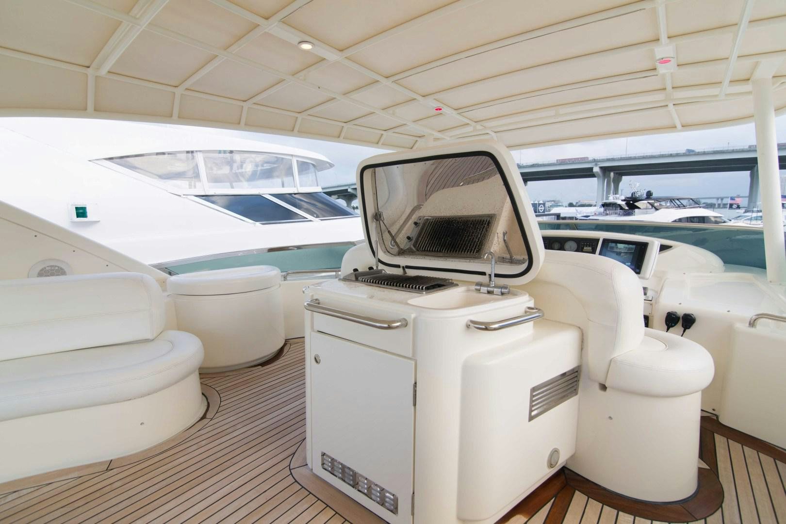 a boat docked in a marina aboard ENCHANTED LADY Yacht for Sale