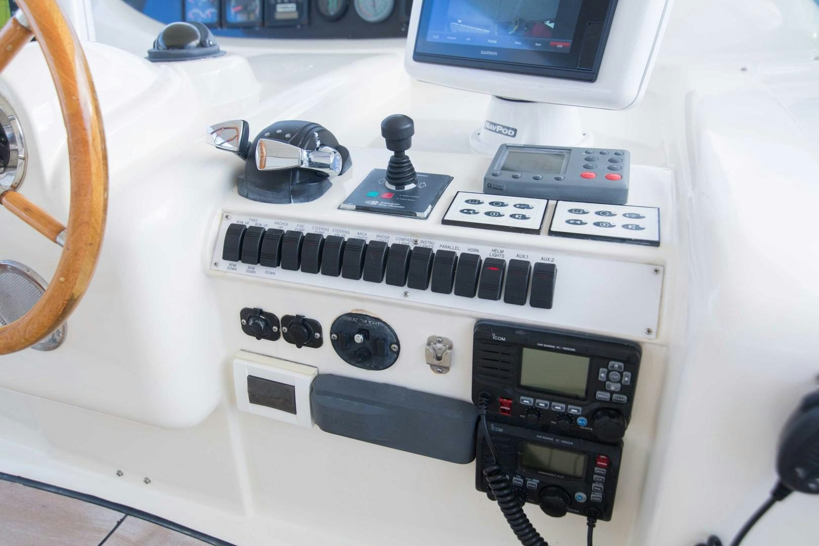 a white machine with a black knob aboard ENCHANTED LADY Yacht for Sale