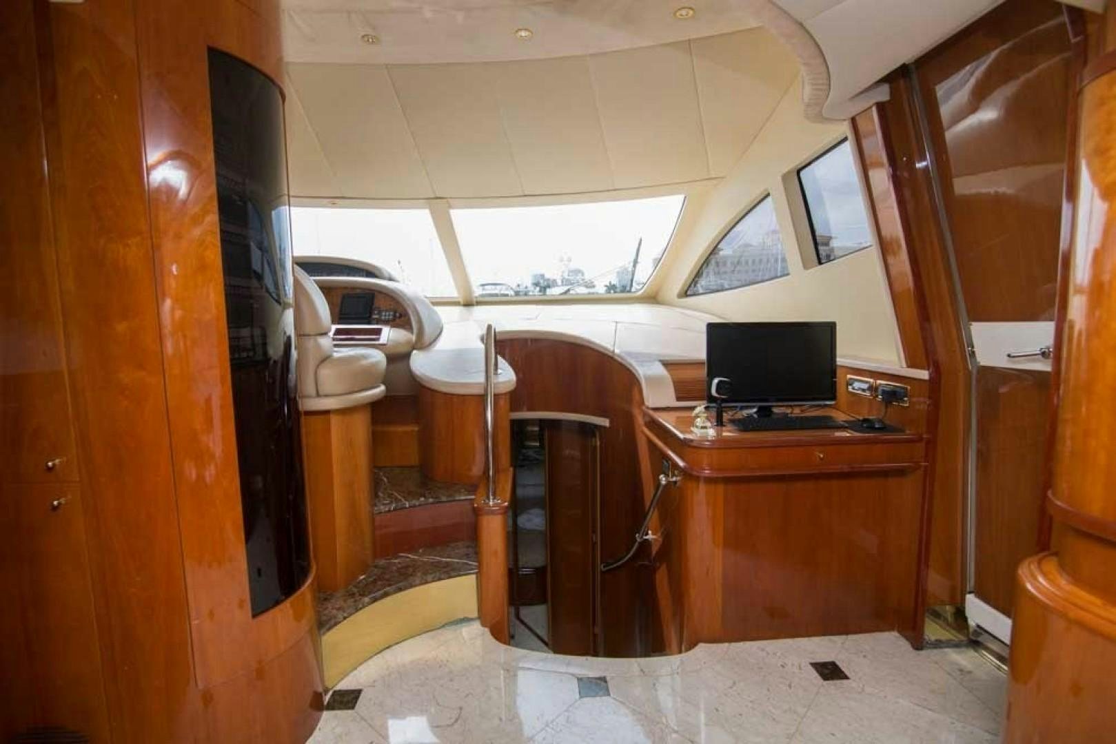 a room with a desk and a laptop aboard ENCHANTED LADY Yacht for Sale