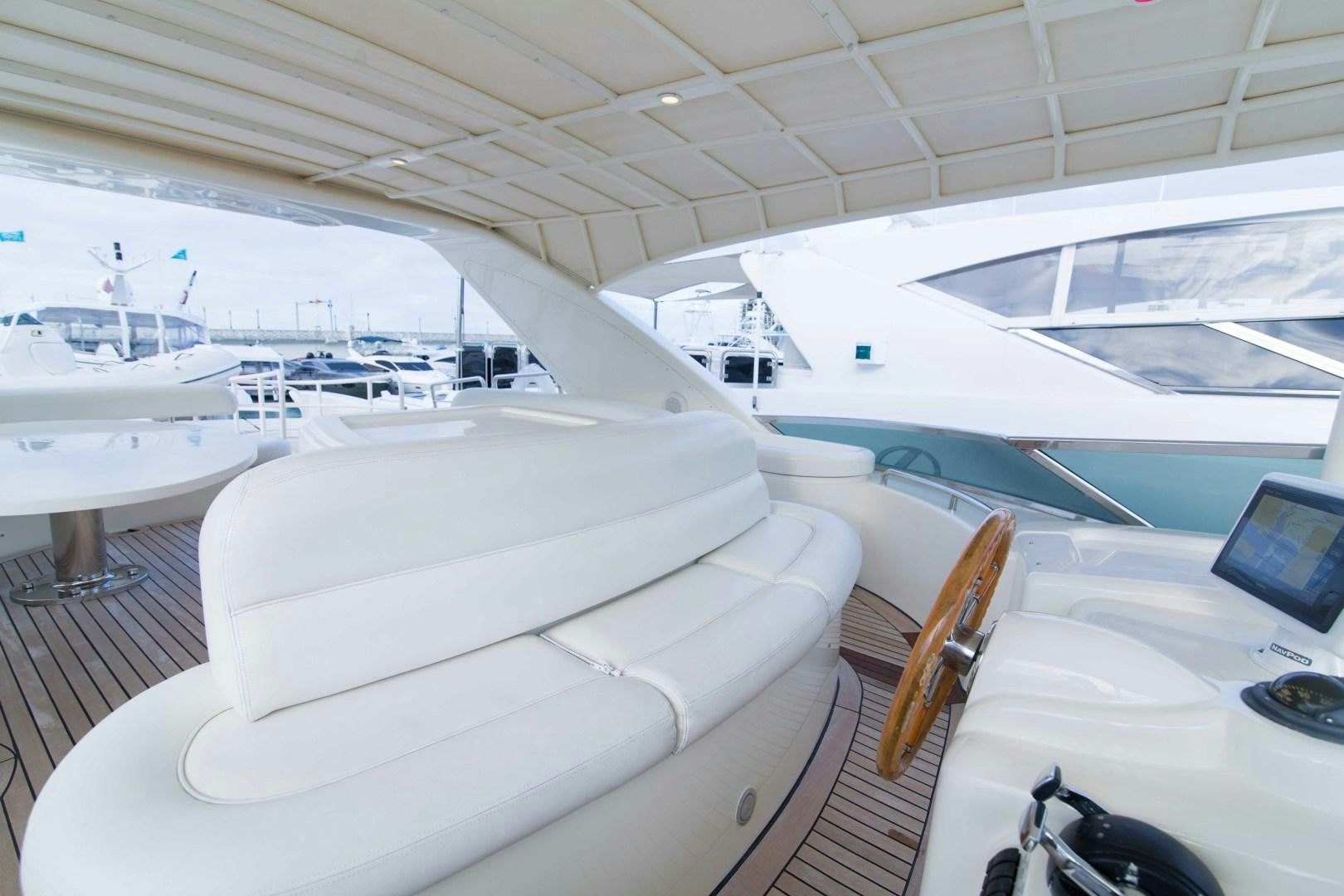 a boat in a large room aboard ENCHANTED LADY Yacht for Sale