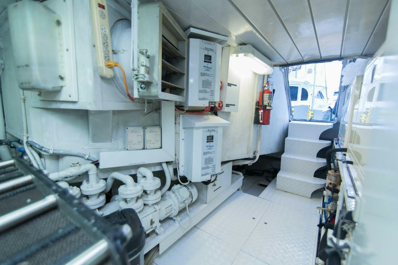 a room with white machines aboard ENCHANTED LADY Yacht for Sale