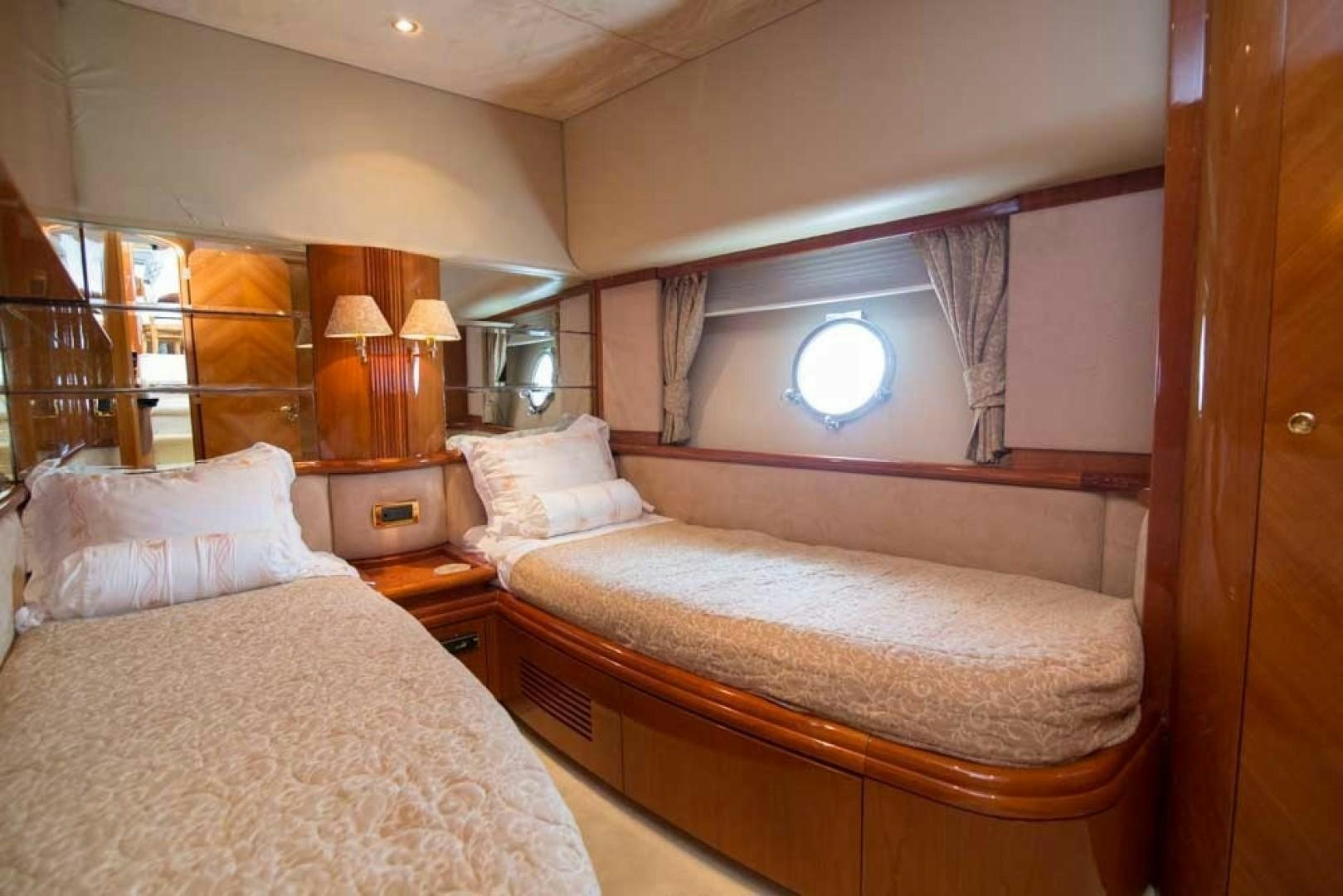 a room with two beds aboard ENCHANTED LADY Yacht for Sale