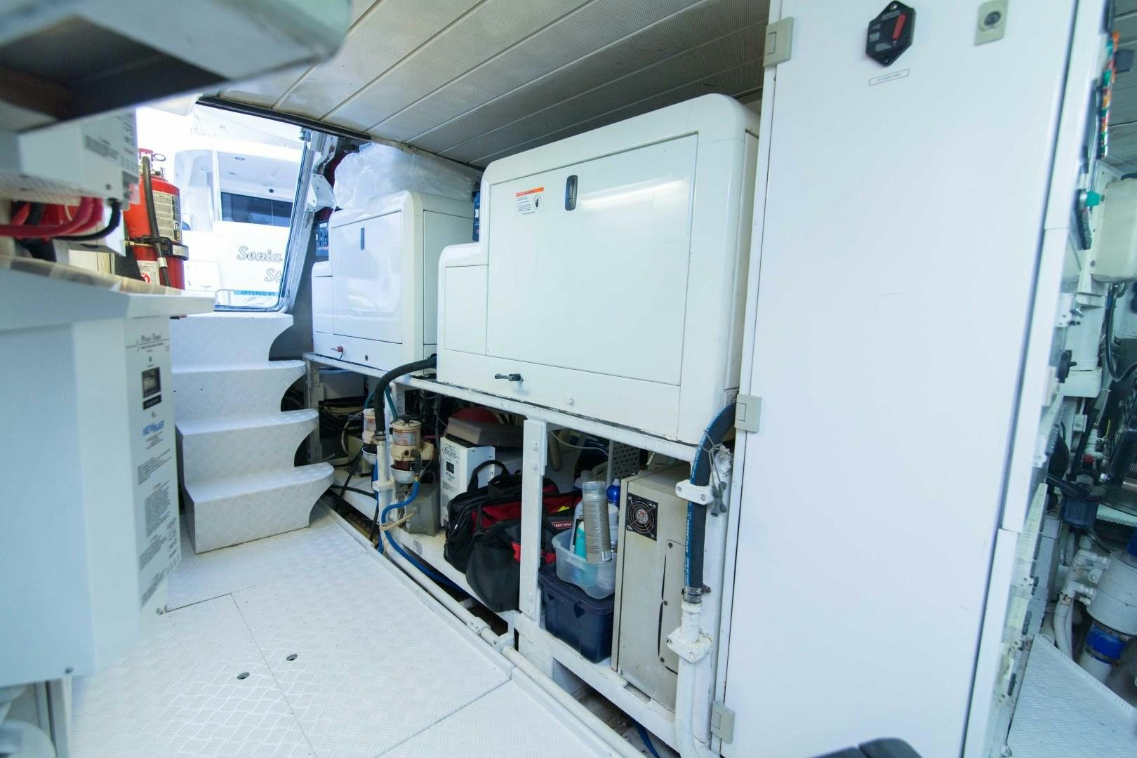 a room with white cabinets aboard ENCHANTED LADY Yacht for Sale