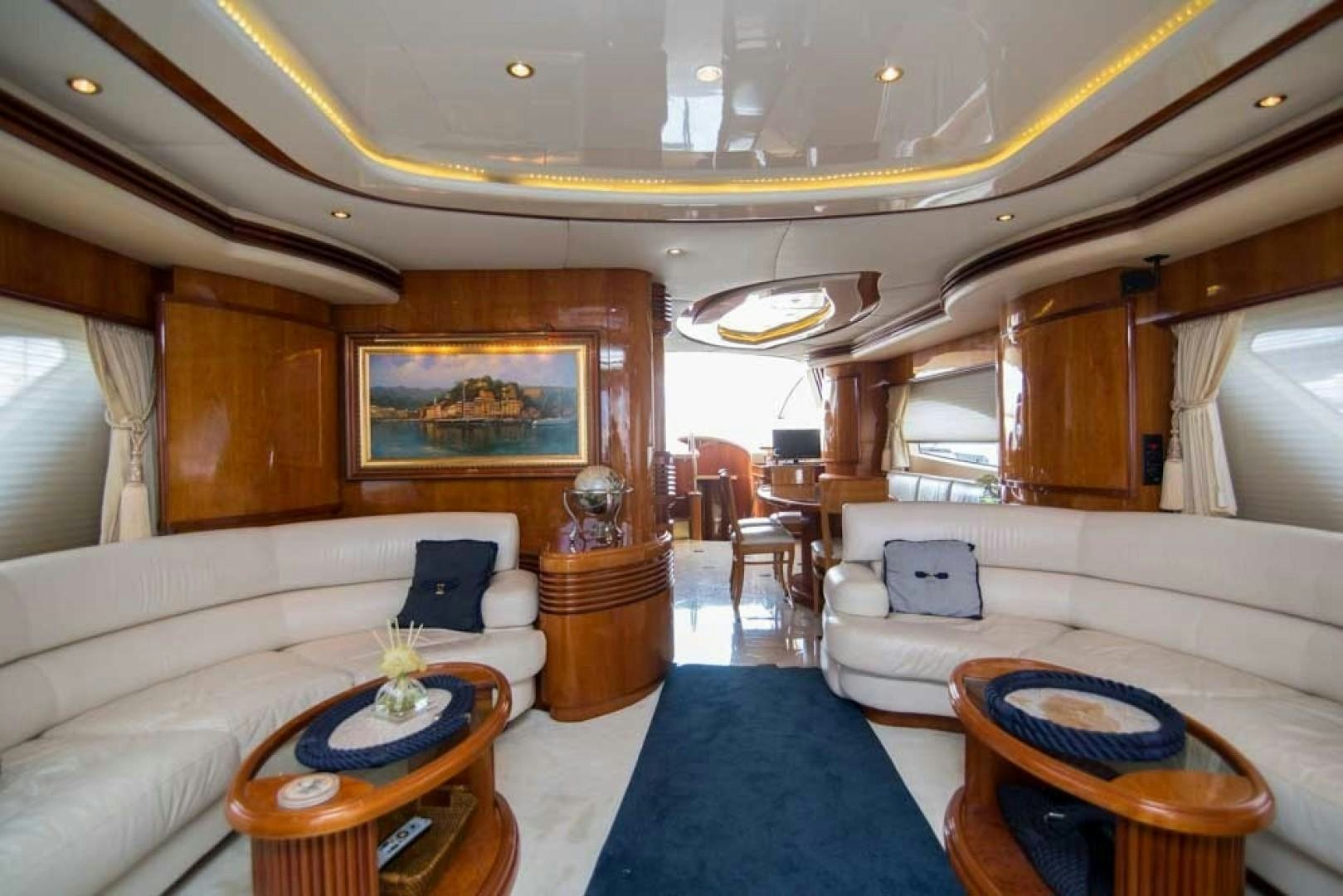 a large living room with a large window aboard ENCHANTED LADY Yacht for Sale