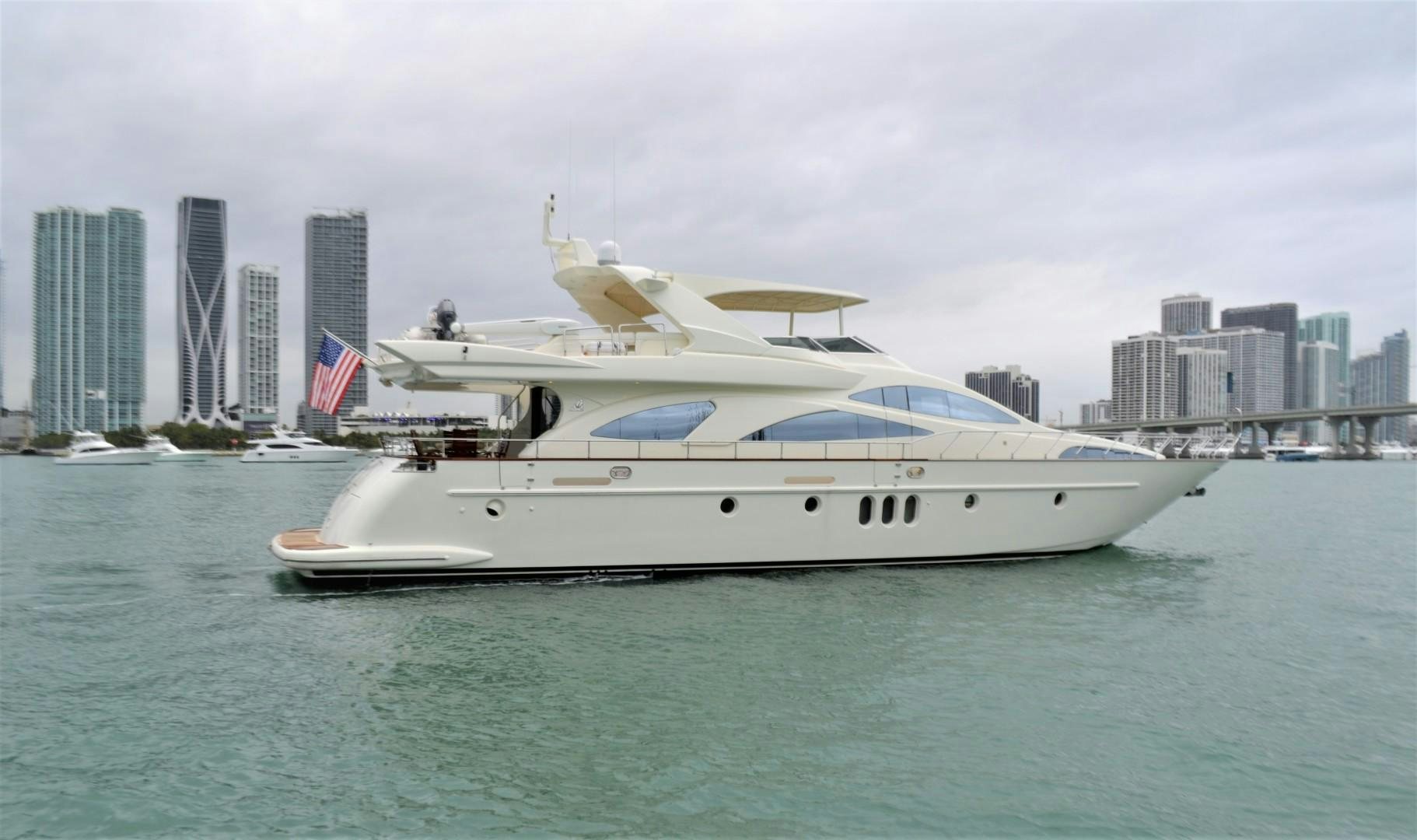 a large white boat in the water aboard ENCHANTED LADY Yacht for Sale