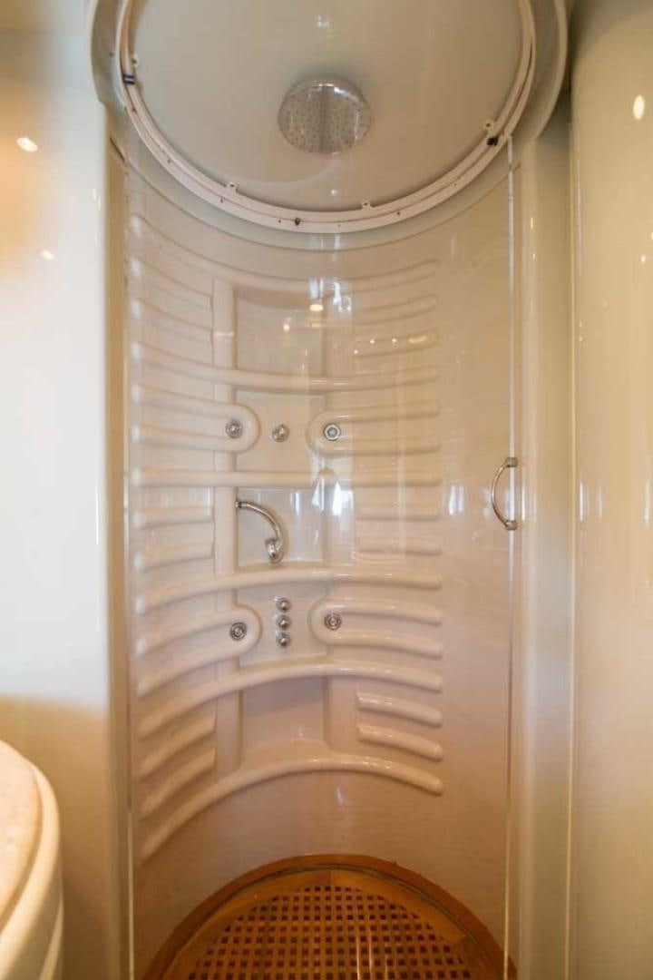 a shower with a glass door aboard ENCHANTED LADY Yacht for Sale