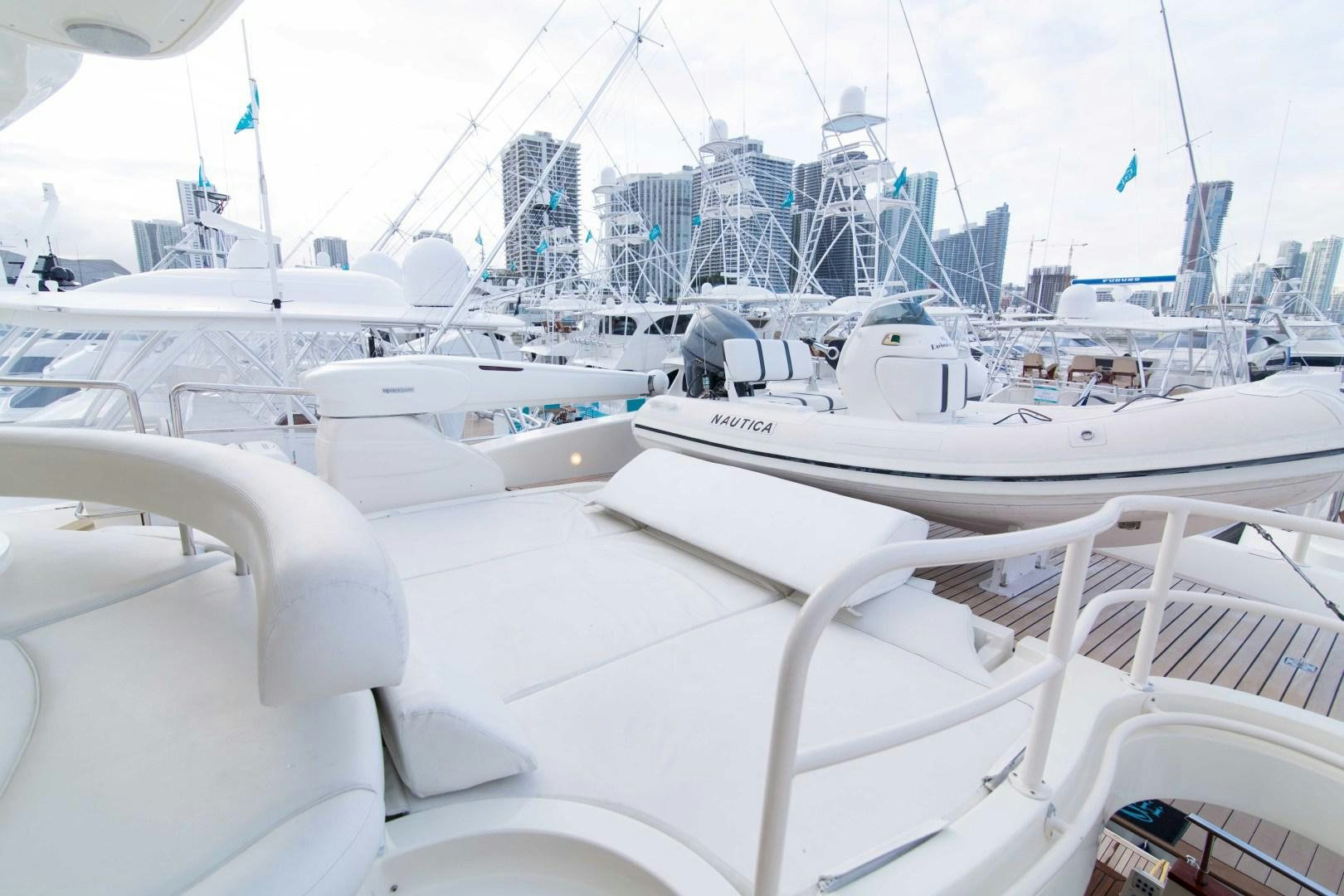 a group of boats in a harbor aboard ENCHANTED LADY Yacht for Sale