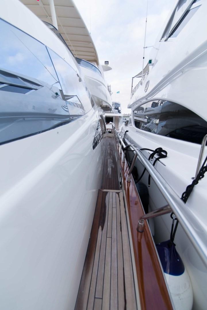 a boat with a deck aboard ENCHANTED LADY Yacht for Sale