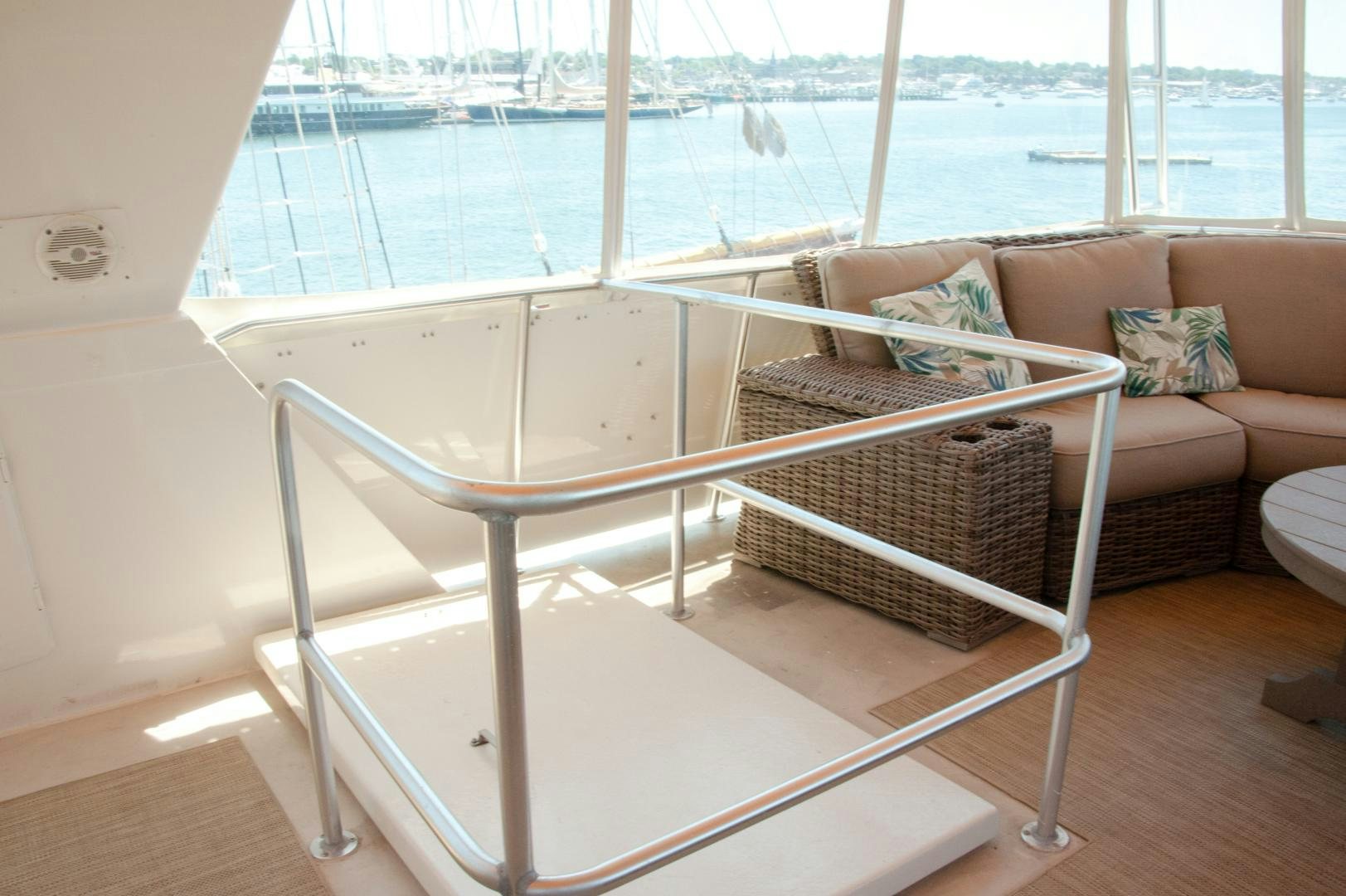 a white chair on a porch aboard OCEAN ROMANCE Yacht for Sale