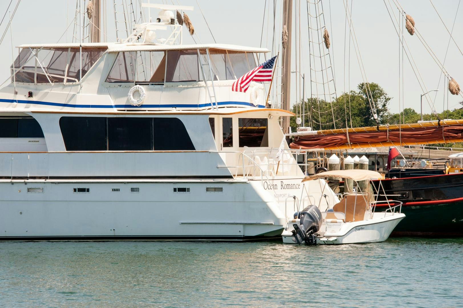 a couple of boats are parked in the water aboard OCEAN ROMANCE Yacht for Sale