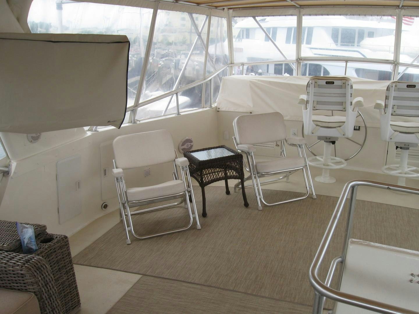 a boat with chairs and tables aboard OCEAN ROMANCE Yacht for Sale