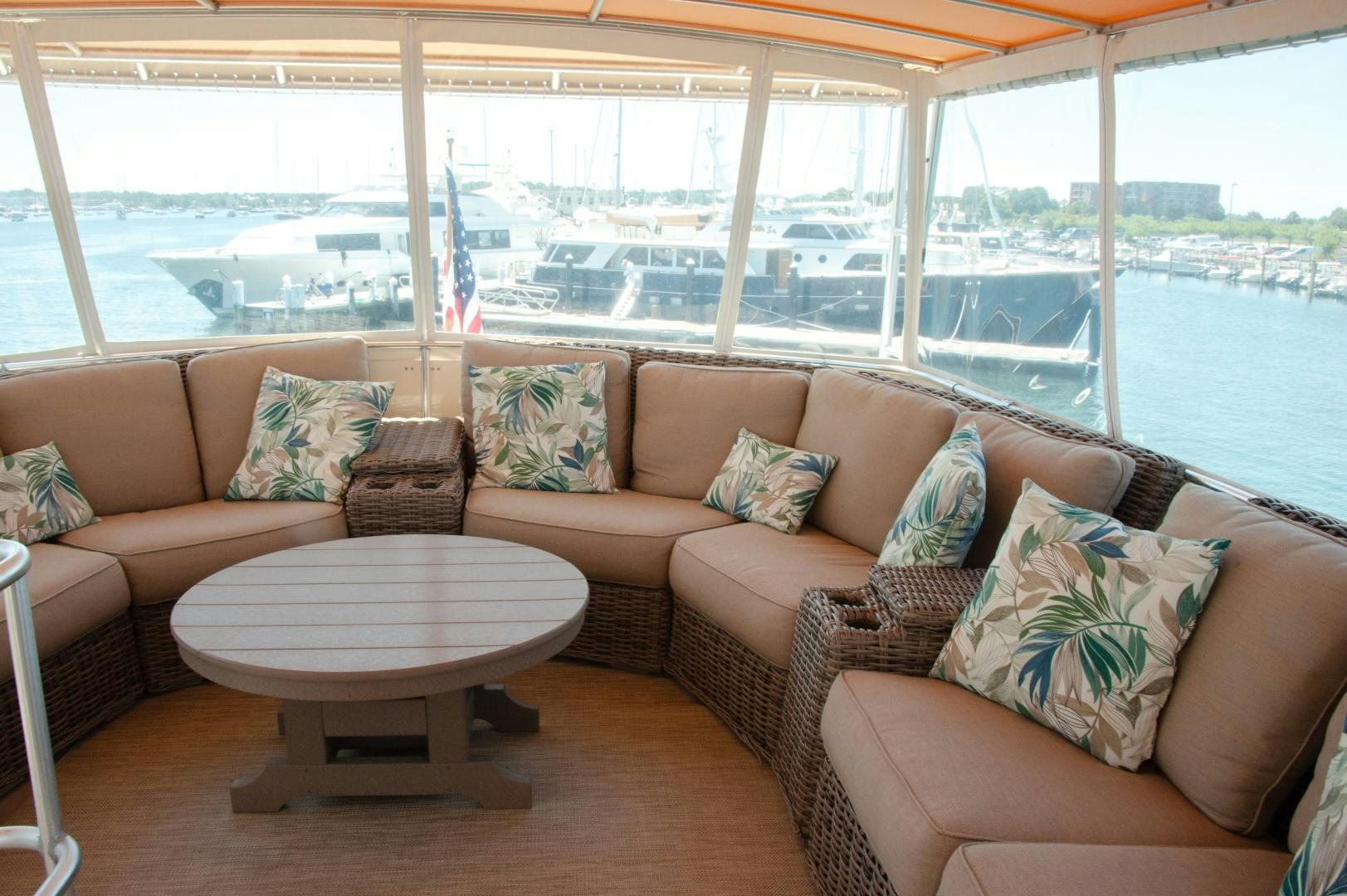a living room with a large window aboard OCEAN ROMANCE Yacht for Sale