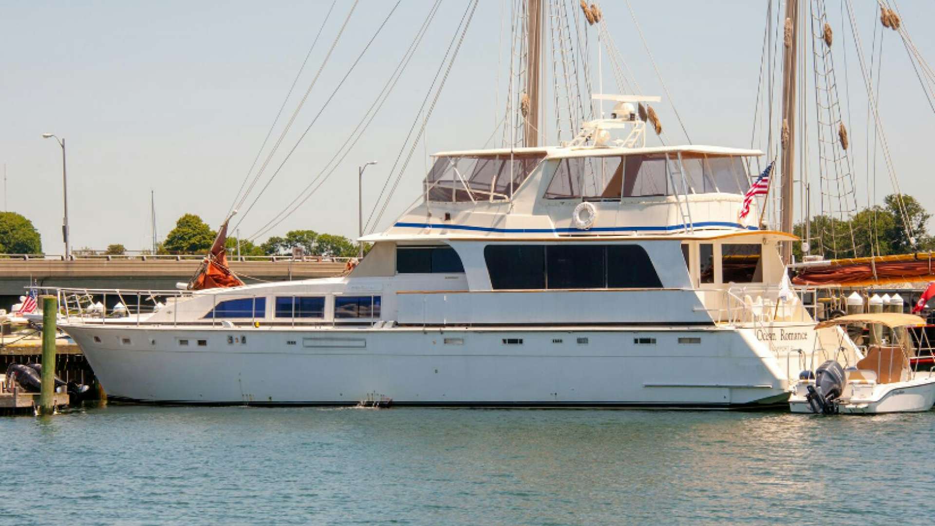 a large white boat in the water aboard OCEAN ROMANCE Yacht for Sale