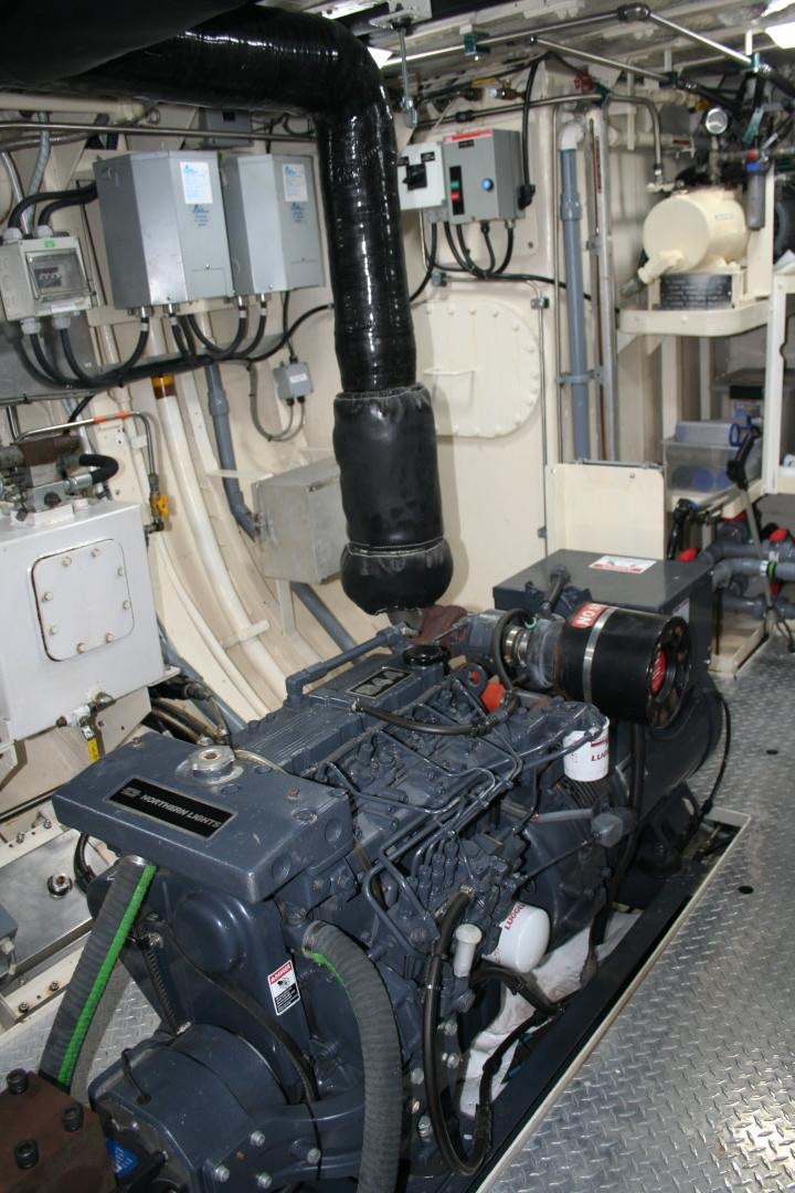 a machine with a black pipe aboard SINDBAD Yacht for Sale